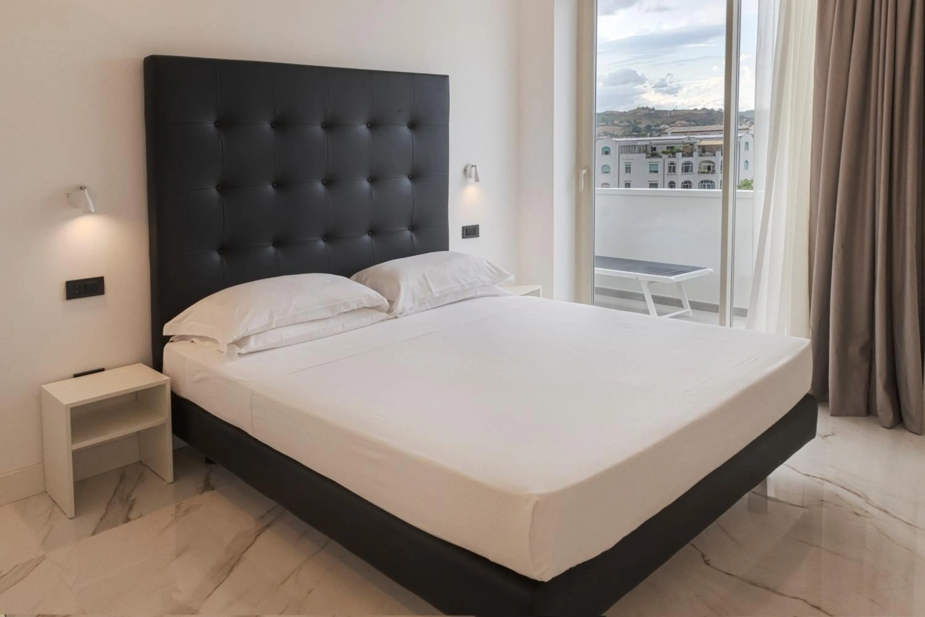 Bed in Hotel Villa Corallo