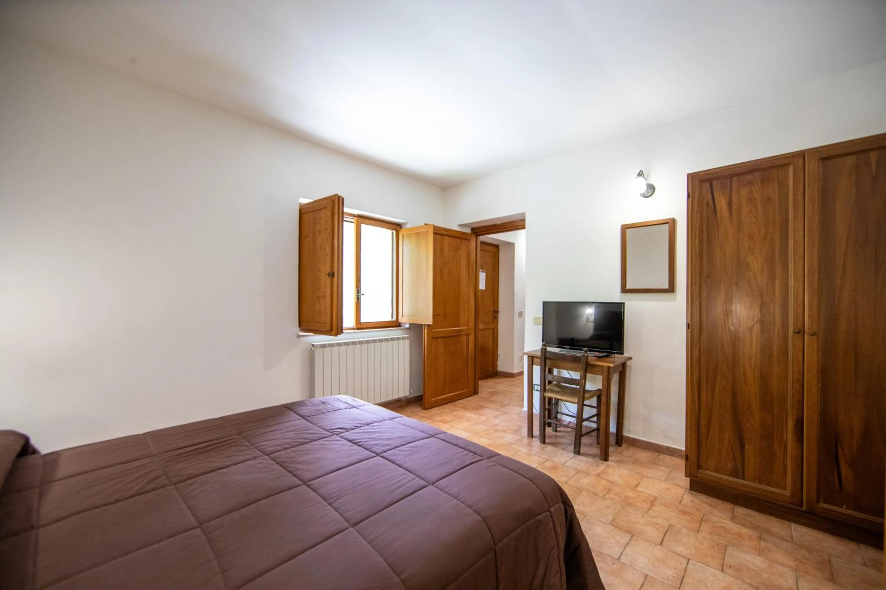 Bed in Agriturismo La Ferrera