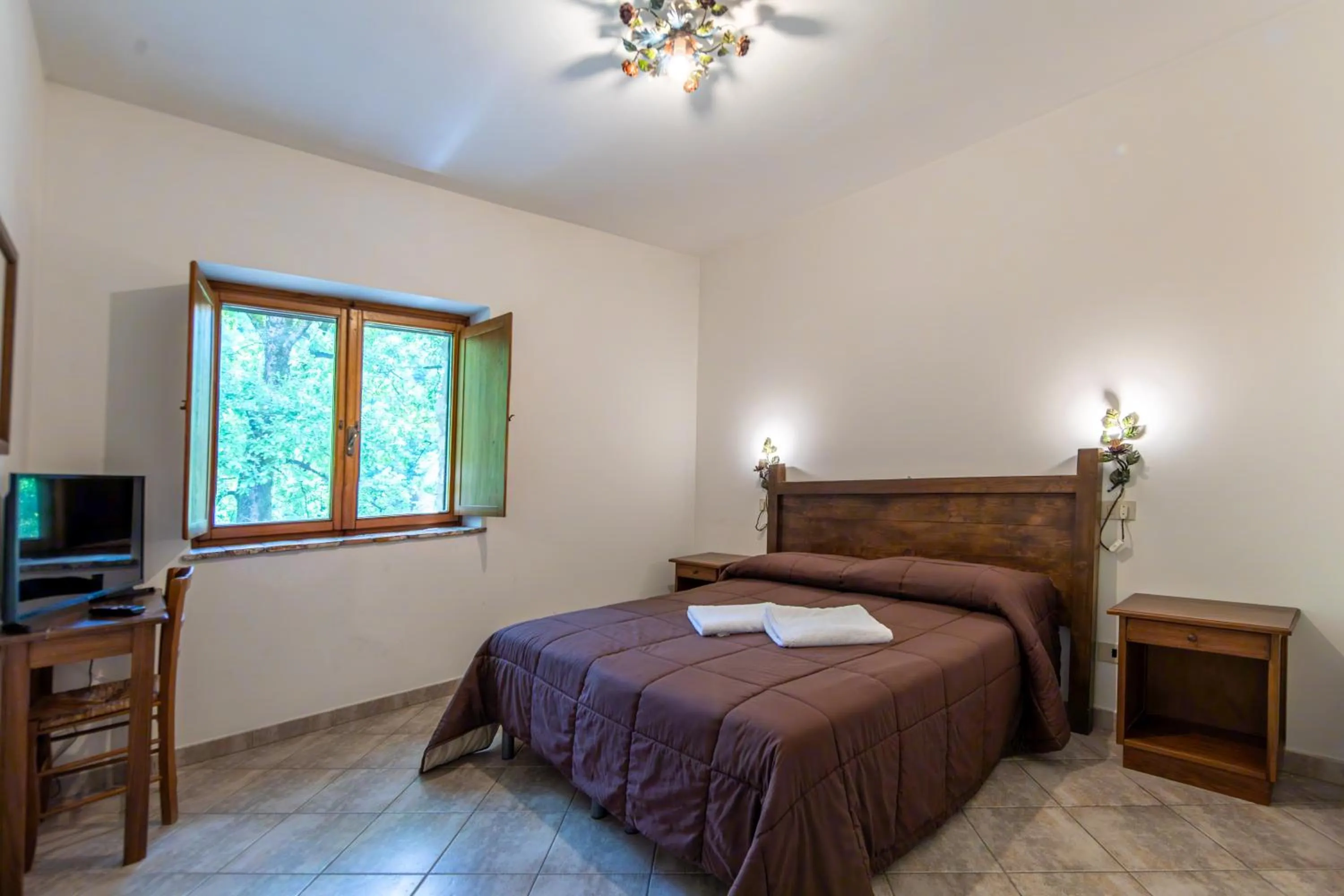 Bed in Agriturismo La Ferrera