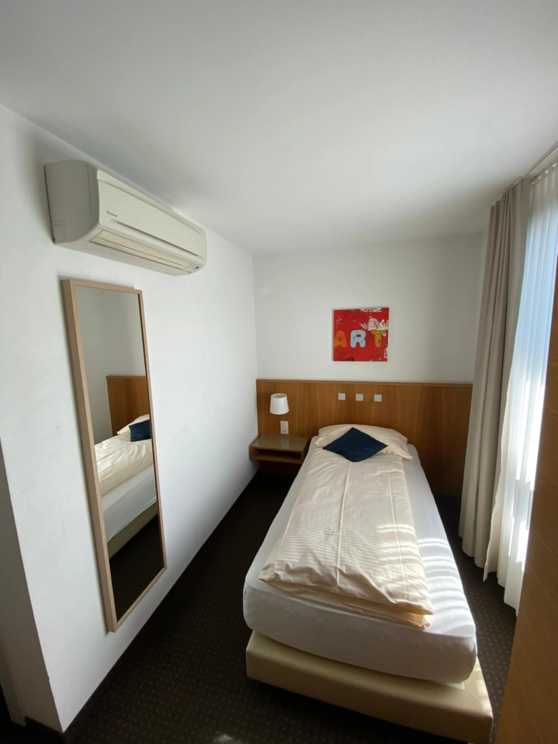 Bed in Businesshotel Lux