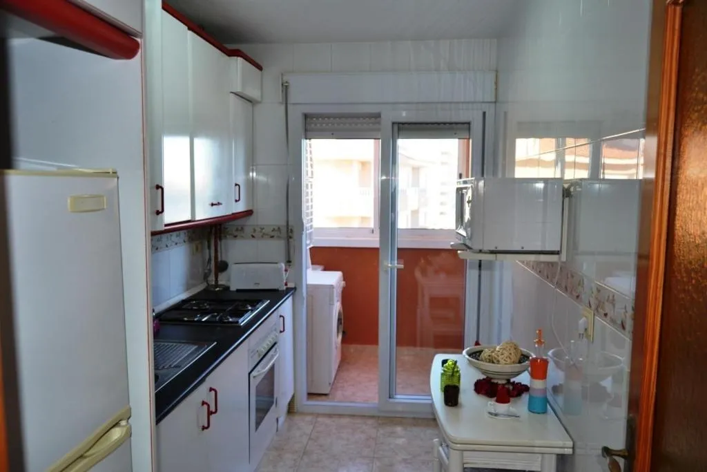 Kitchen or kitchenette in Apartamentos Turísticos Hawaii 6