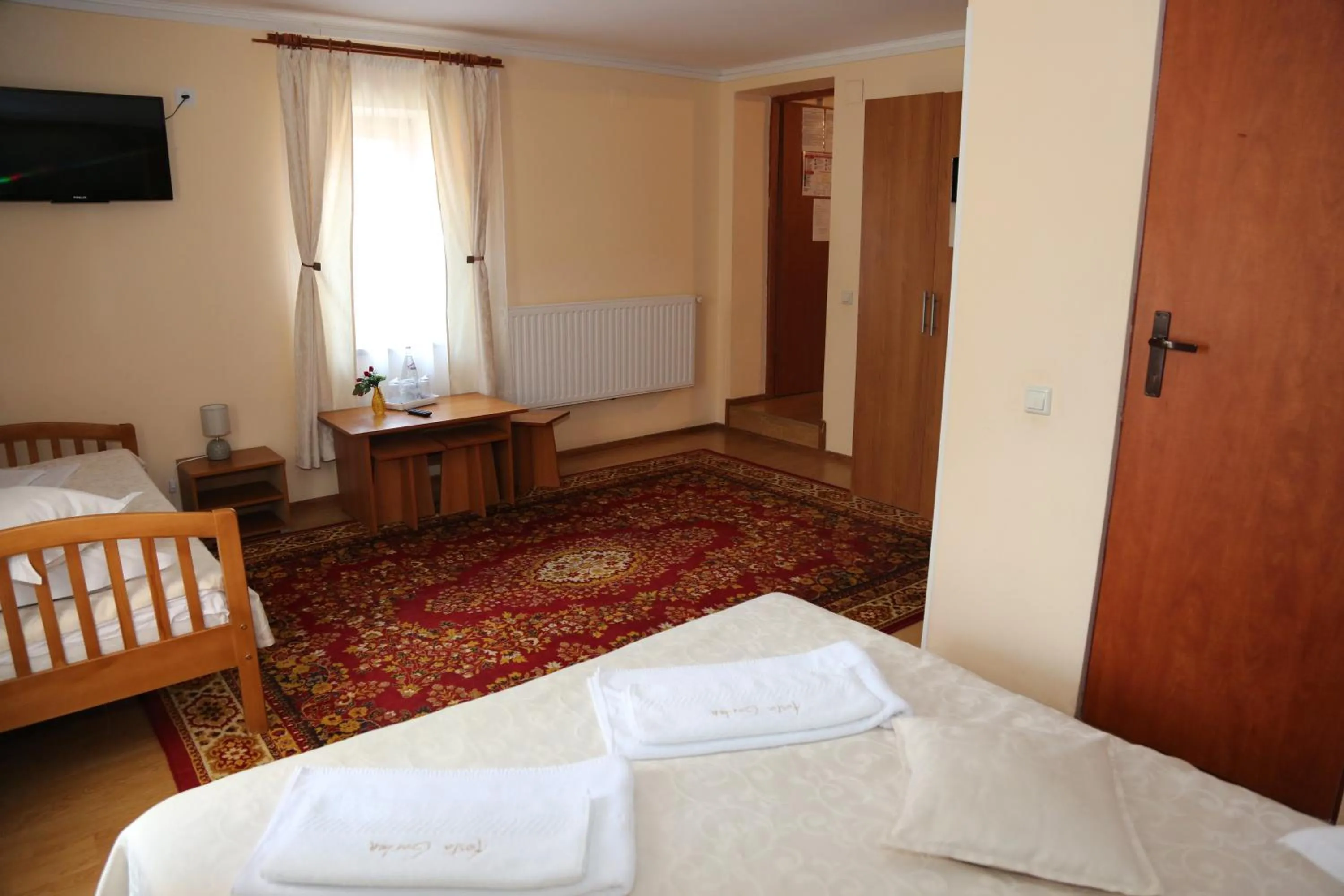 Photo of the whole room, Bed in New Aosta Garden