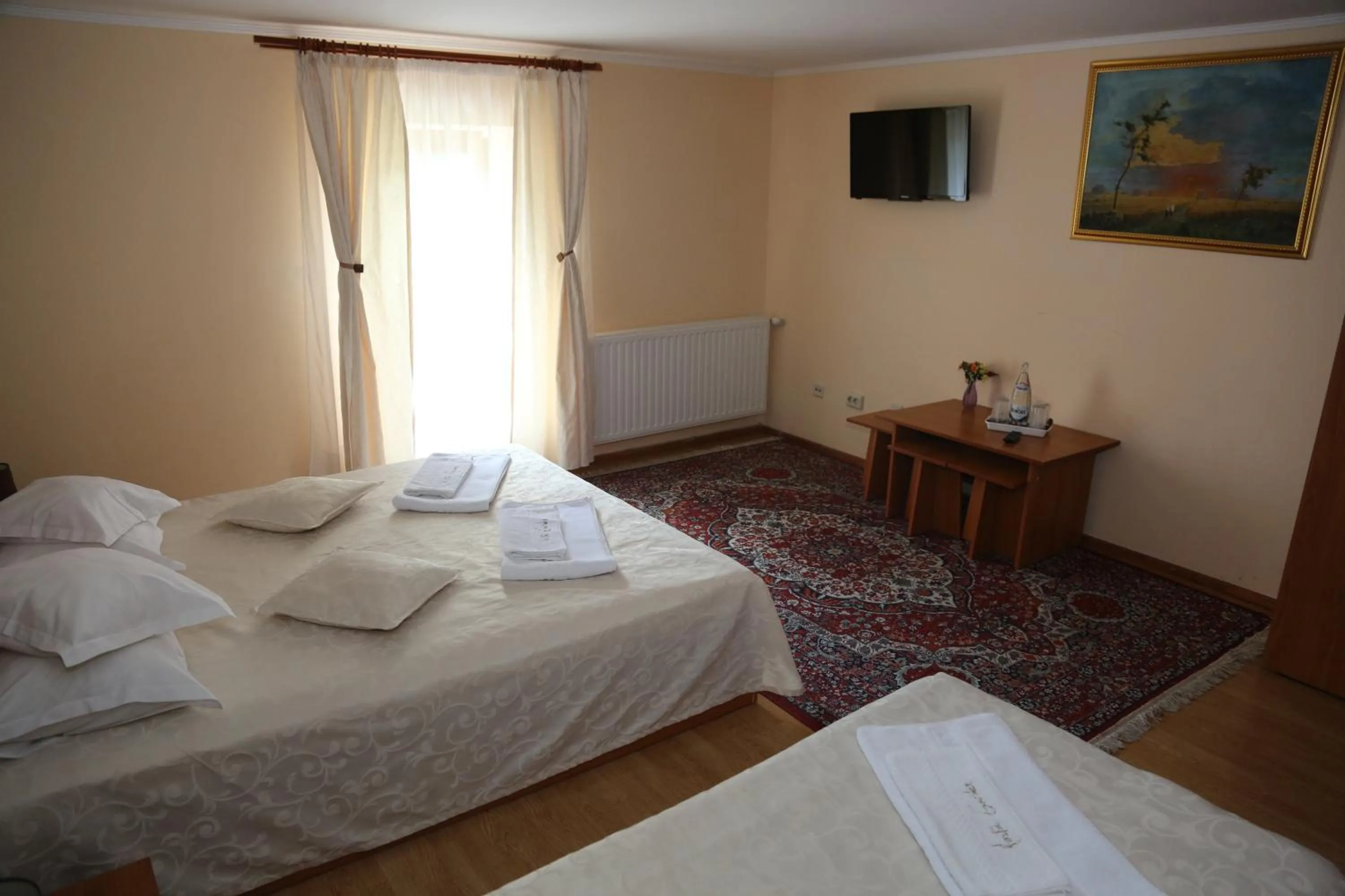 Photo of the whole room, Bed in New Aosta Garden