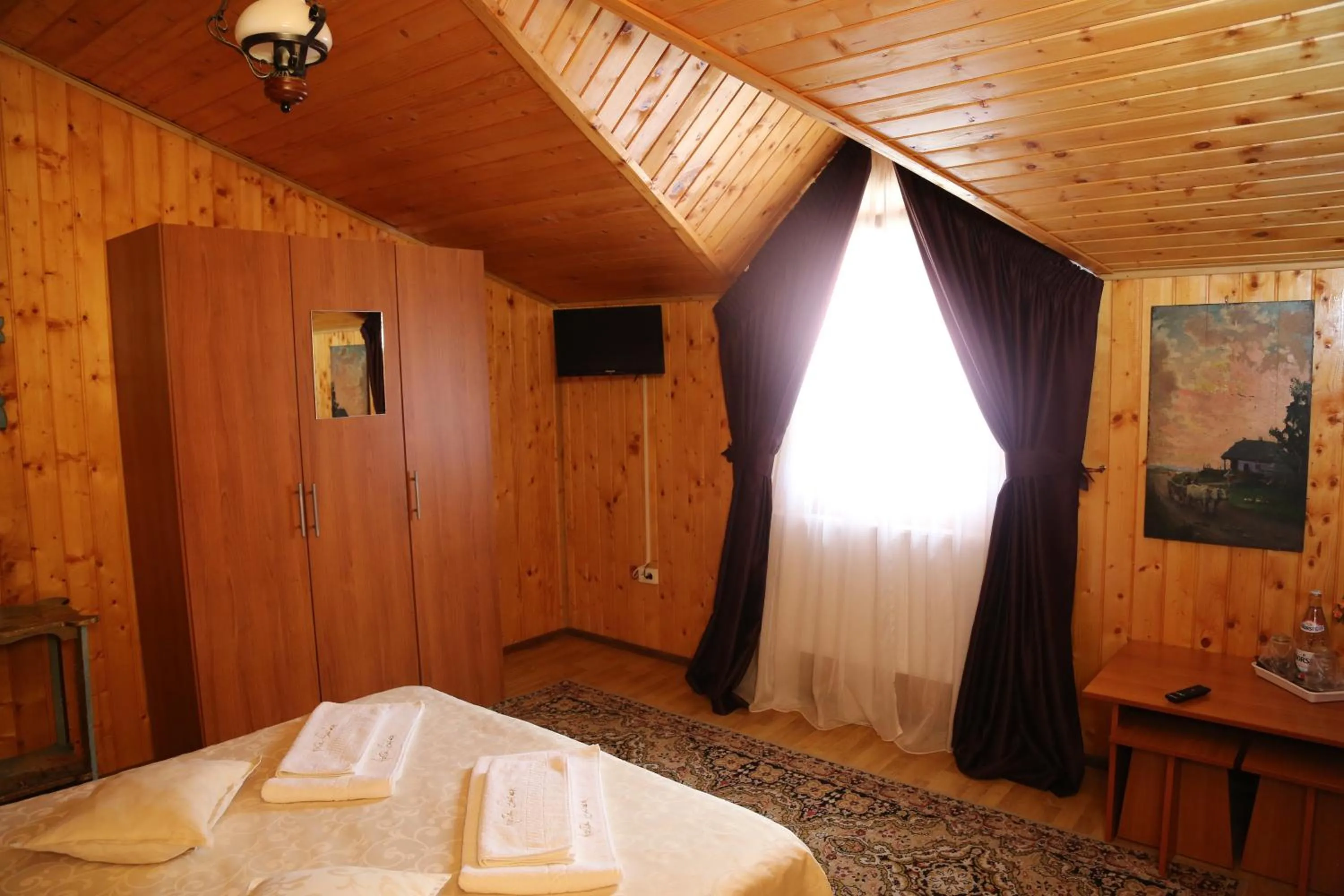 Photo of the whole room, Bed in New Aosta Garden