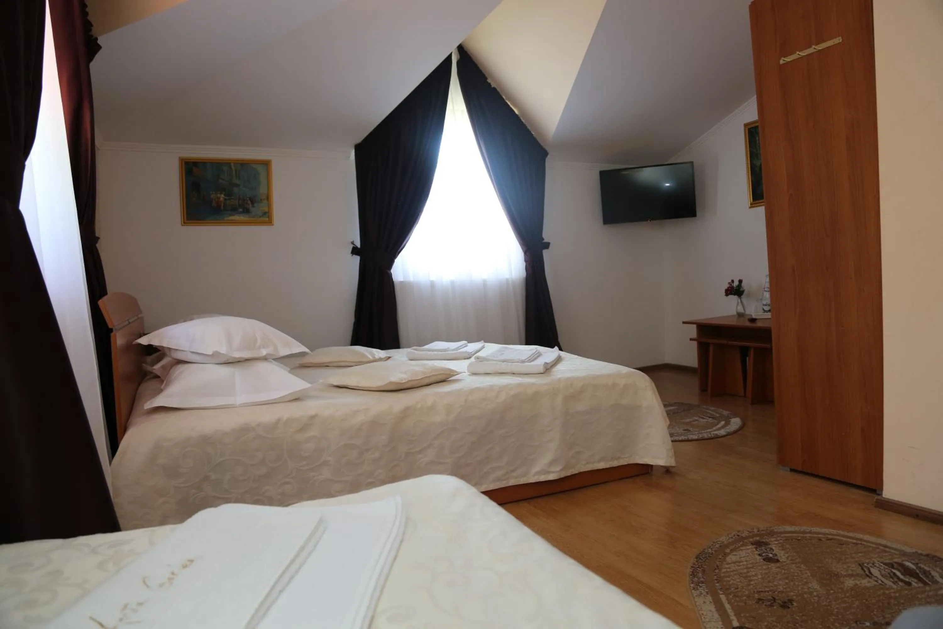 Photo of the whole room, Bed in New Aosta Garden