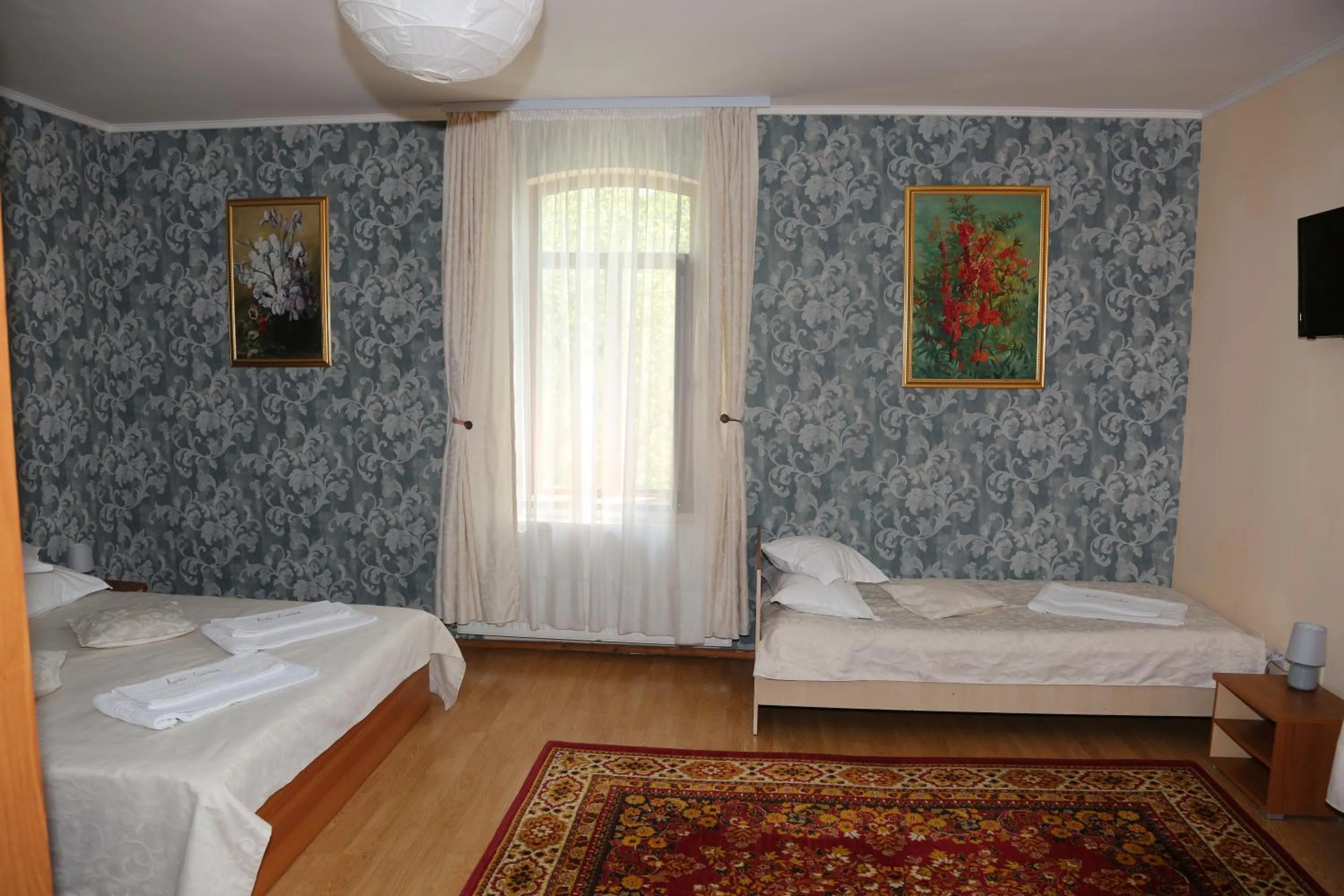 Photo of the whole room, Bed in New Aosta Garden