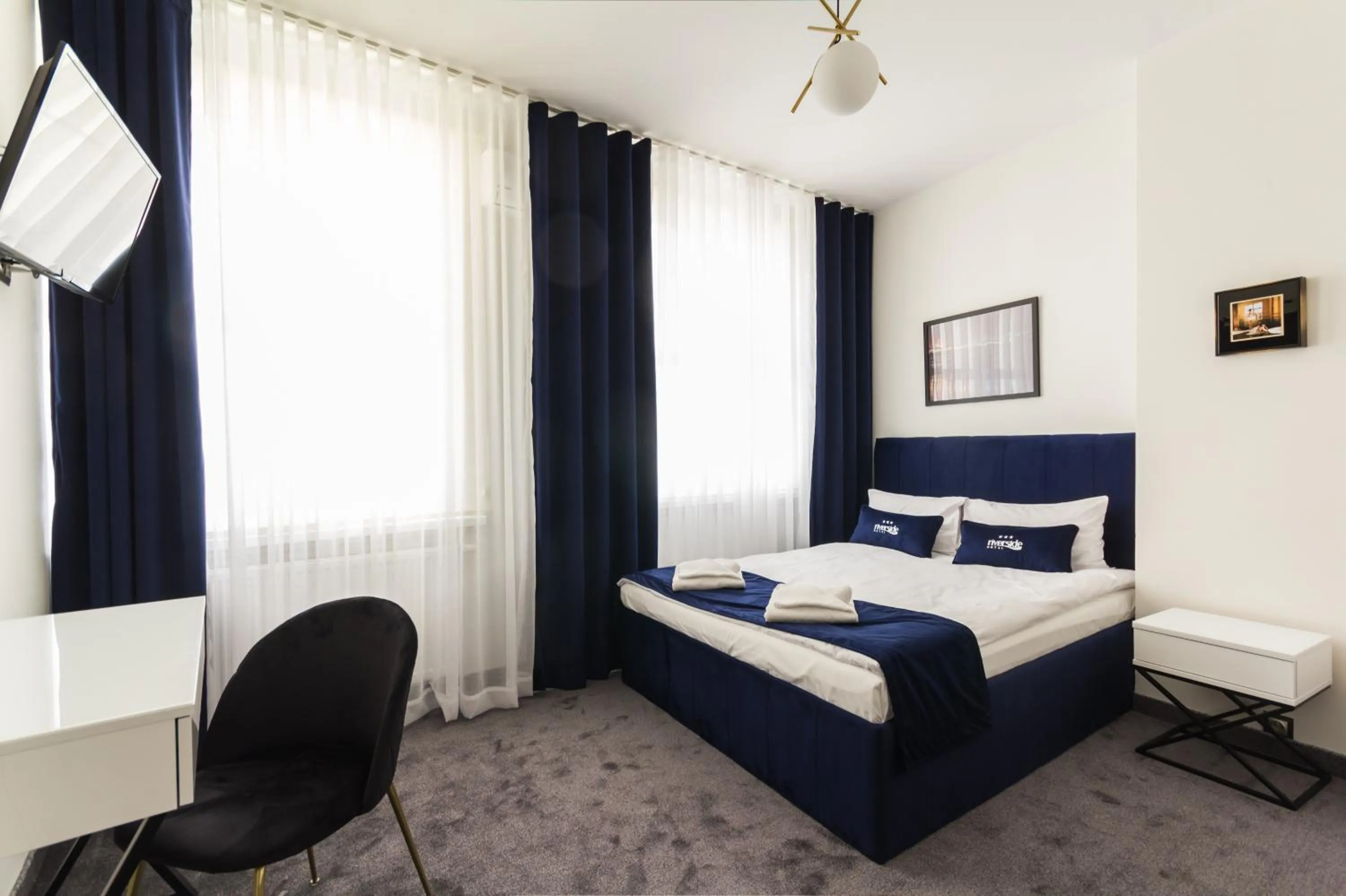 Bed in Riverside Hotel