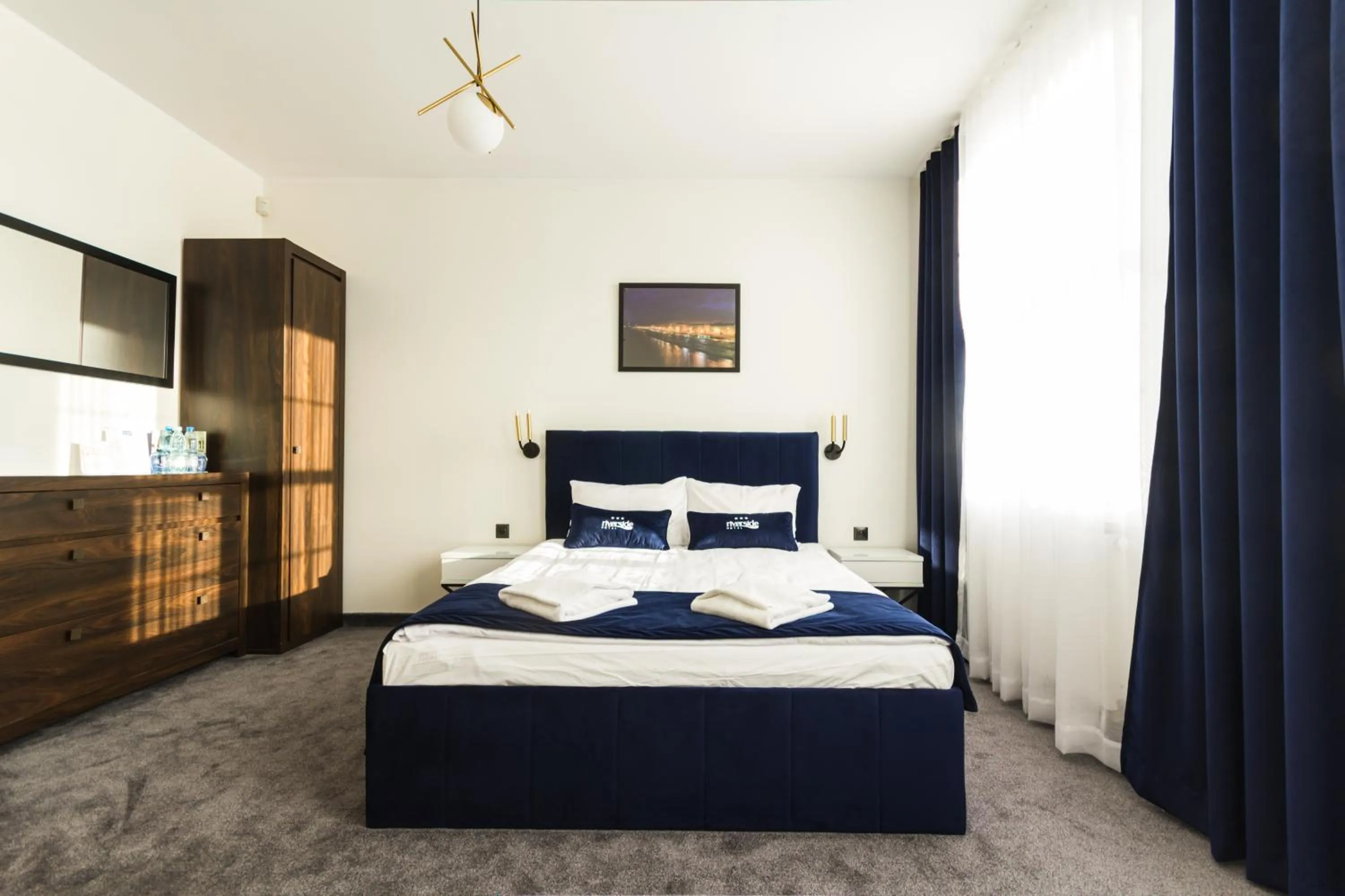 Bed in Riverside Hotel