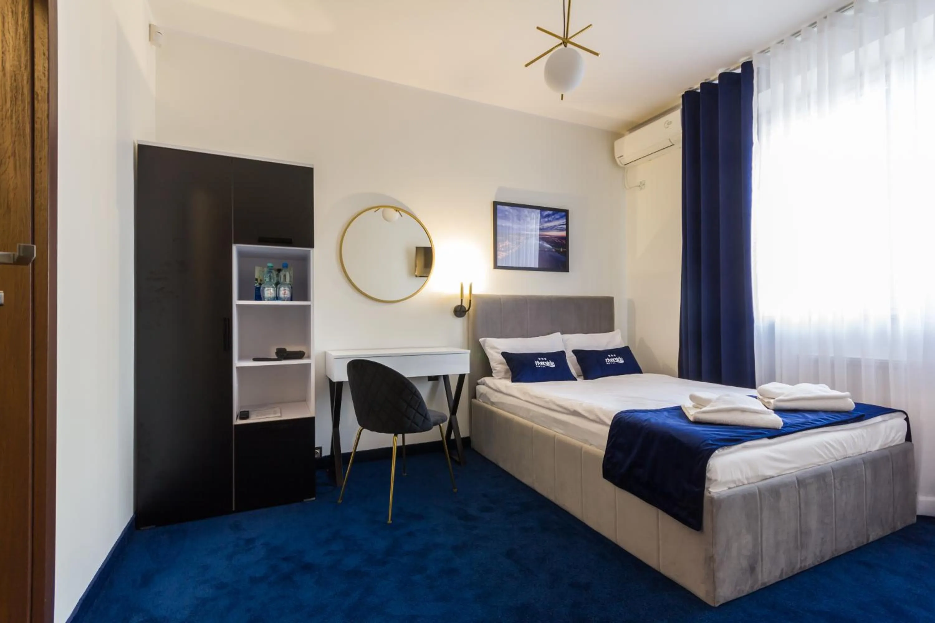 Bed in Riverside Hotel