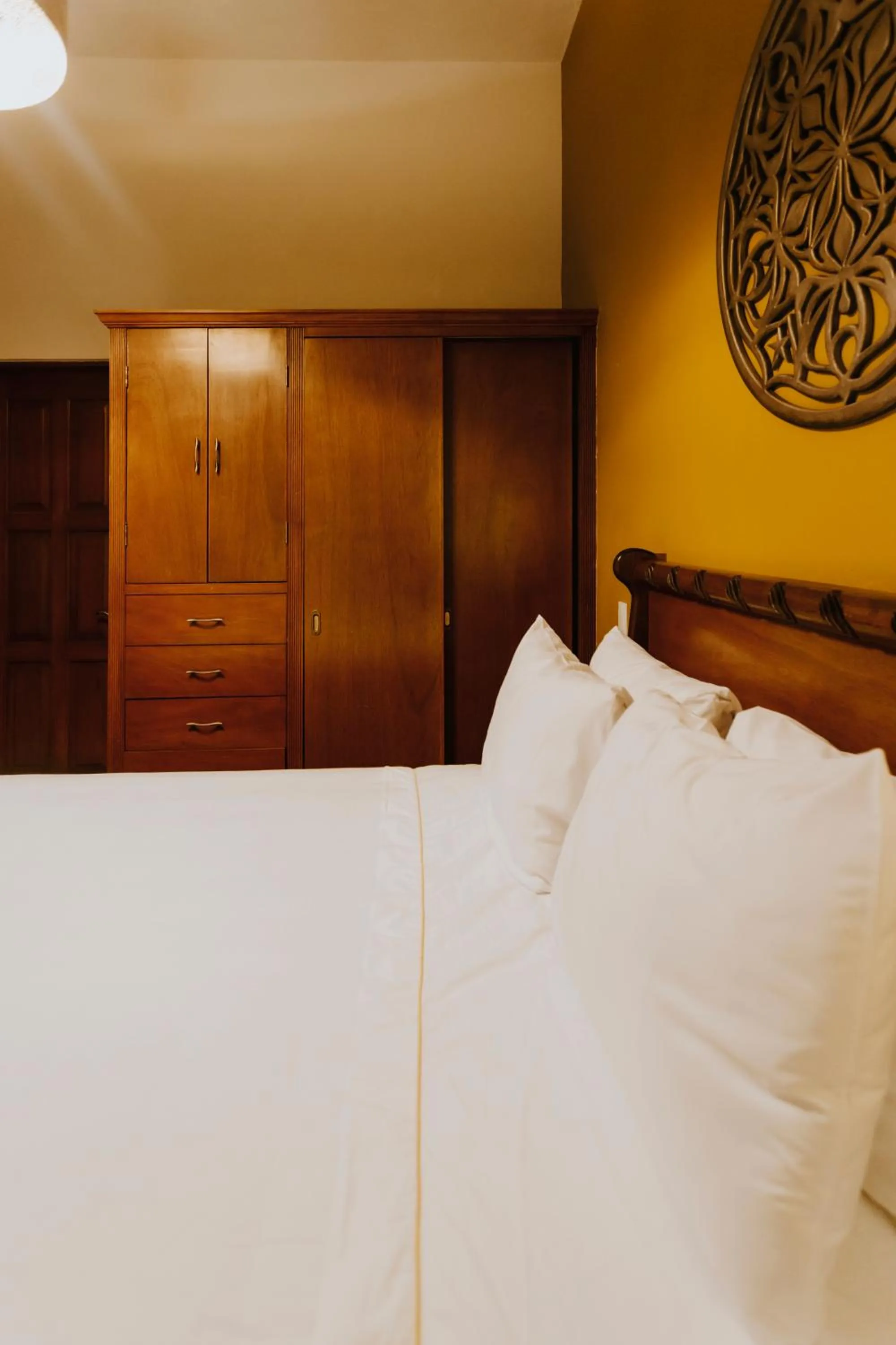 Bedroom, Bed in Dos Patios Querétaro Curamoria Collection