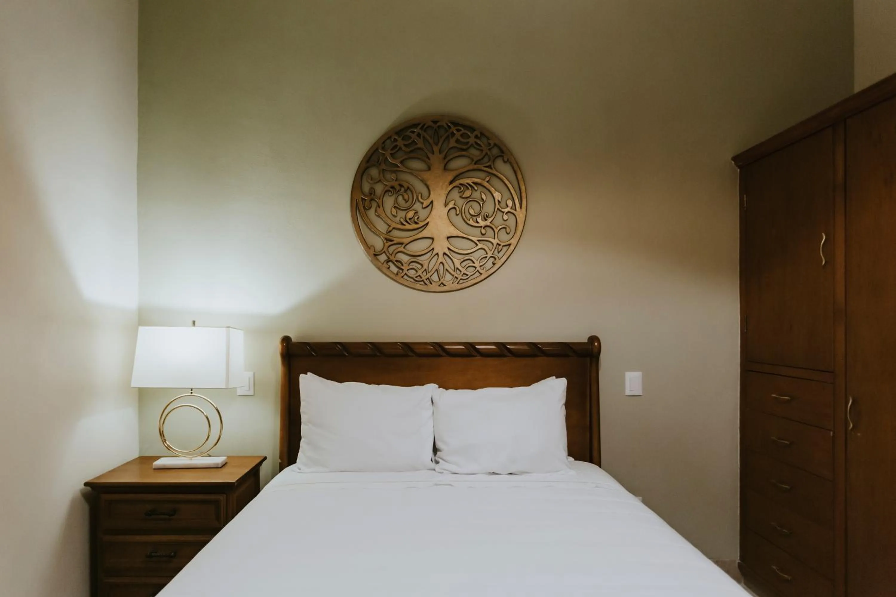 Bed in Dos Patios Querétaro Curamoria Collection