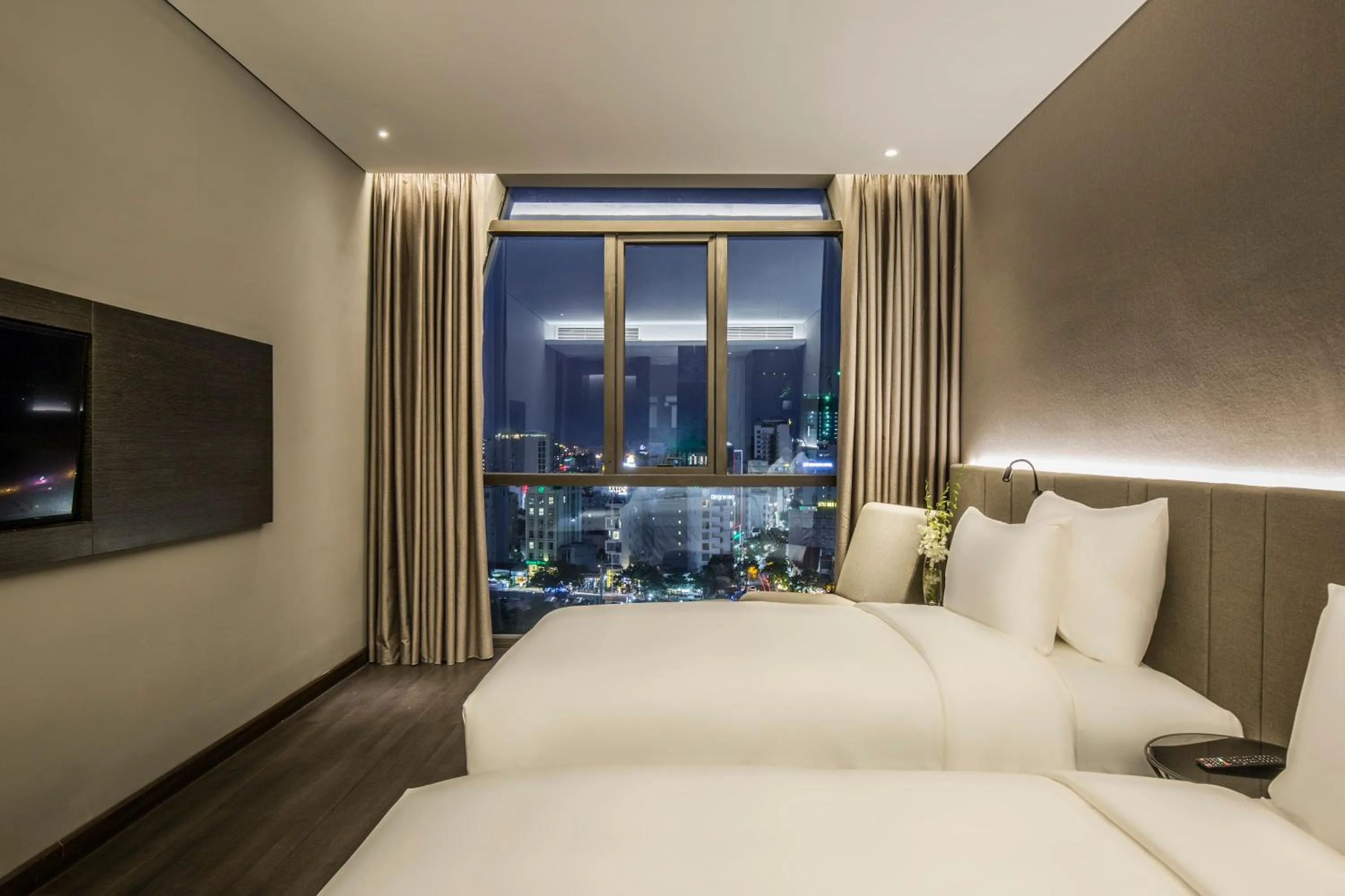 Communal lounge/ TV room, Bed in Stella Maris Beach Danang