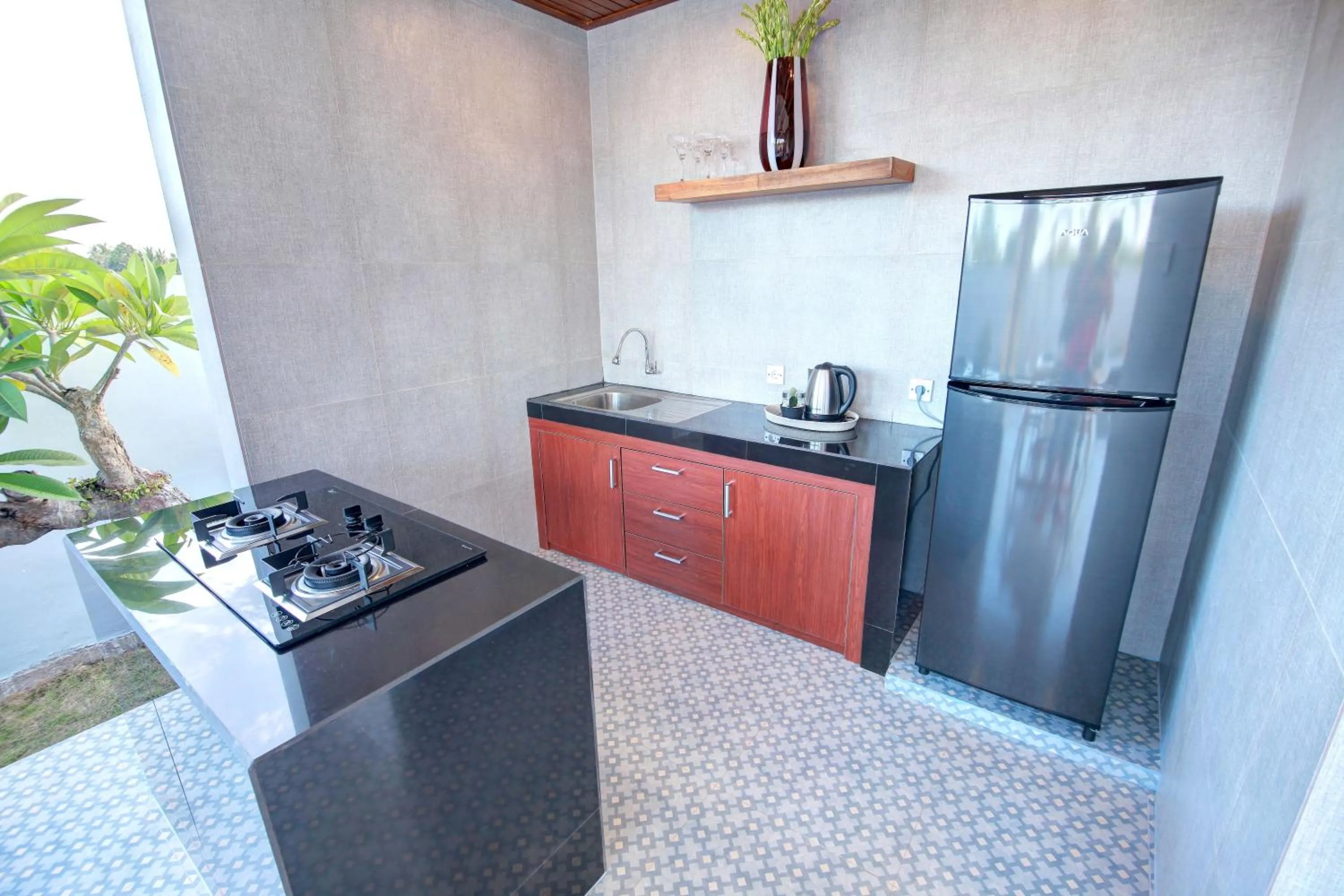 Kitchen or kitchenette in Prawiba Villa