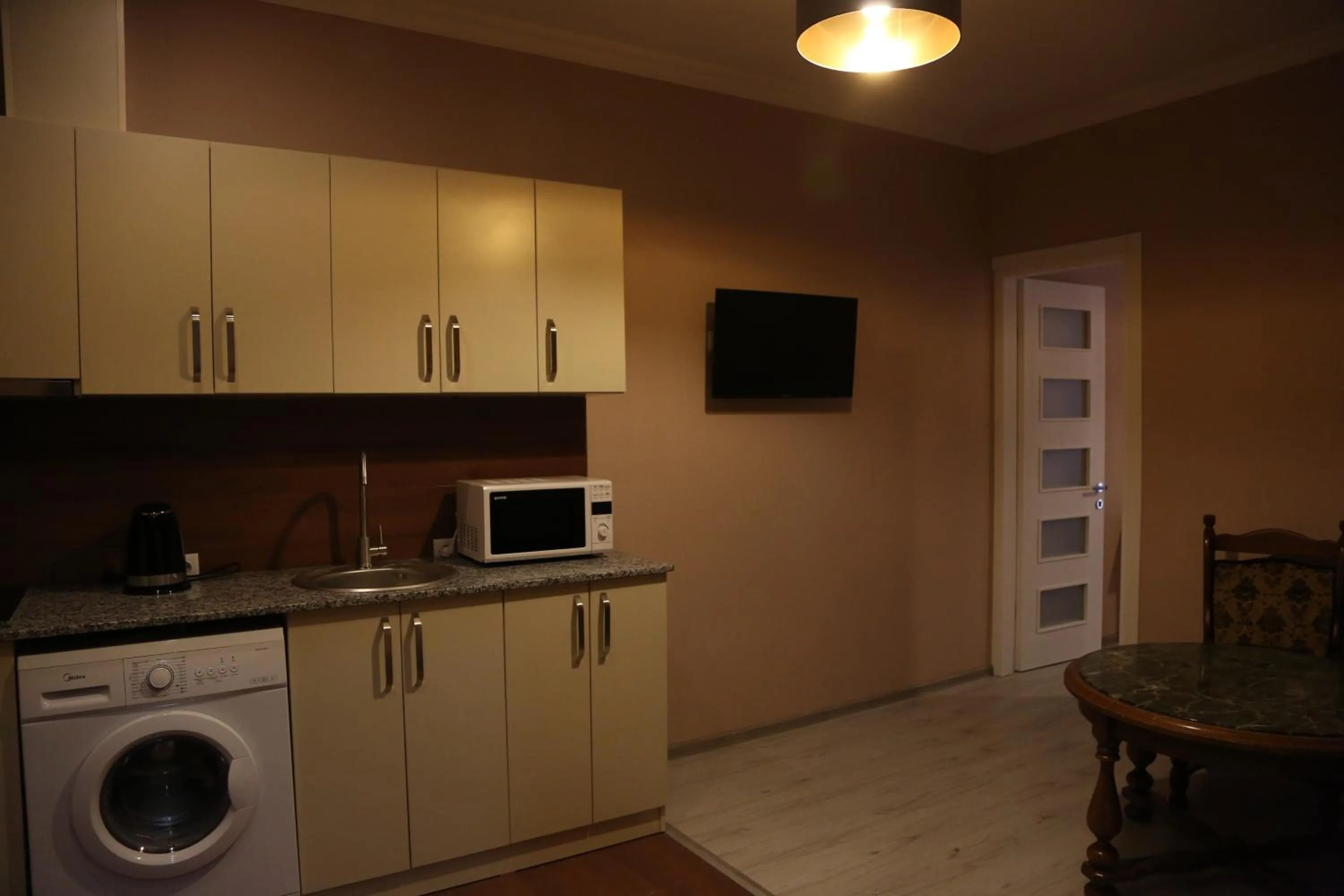 Kitchen or kitchenette in Hotel Soft
