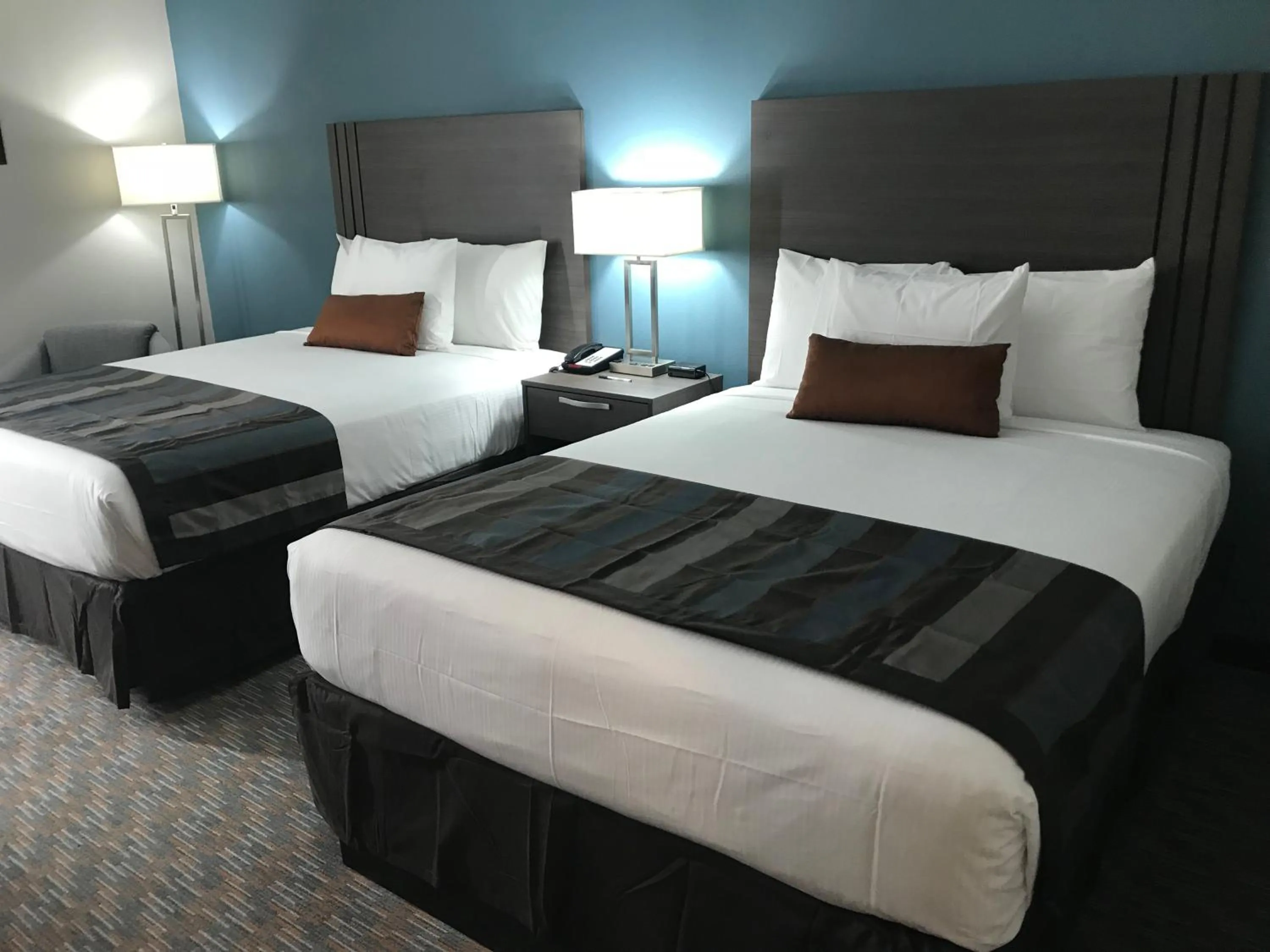Bedroom, Bed in Nobile Hotel Parkway at Celebration Orlando Very Close to Disney Theme Parks