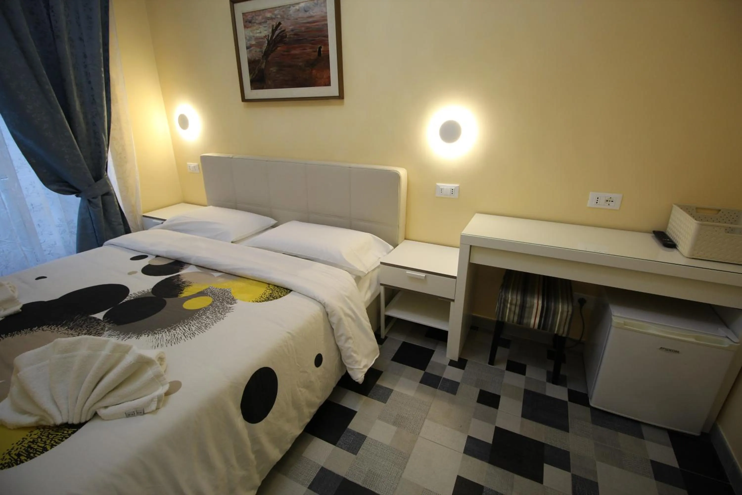 Bed in Quest House Lihong