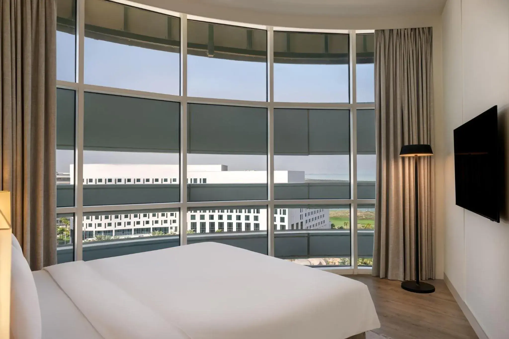 Photo of the whole room, Bed in Yas Plaza Marina by IHG Photo of the whole room, Bed in Yas Plaza Marina by IHG