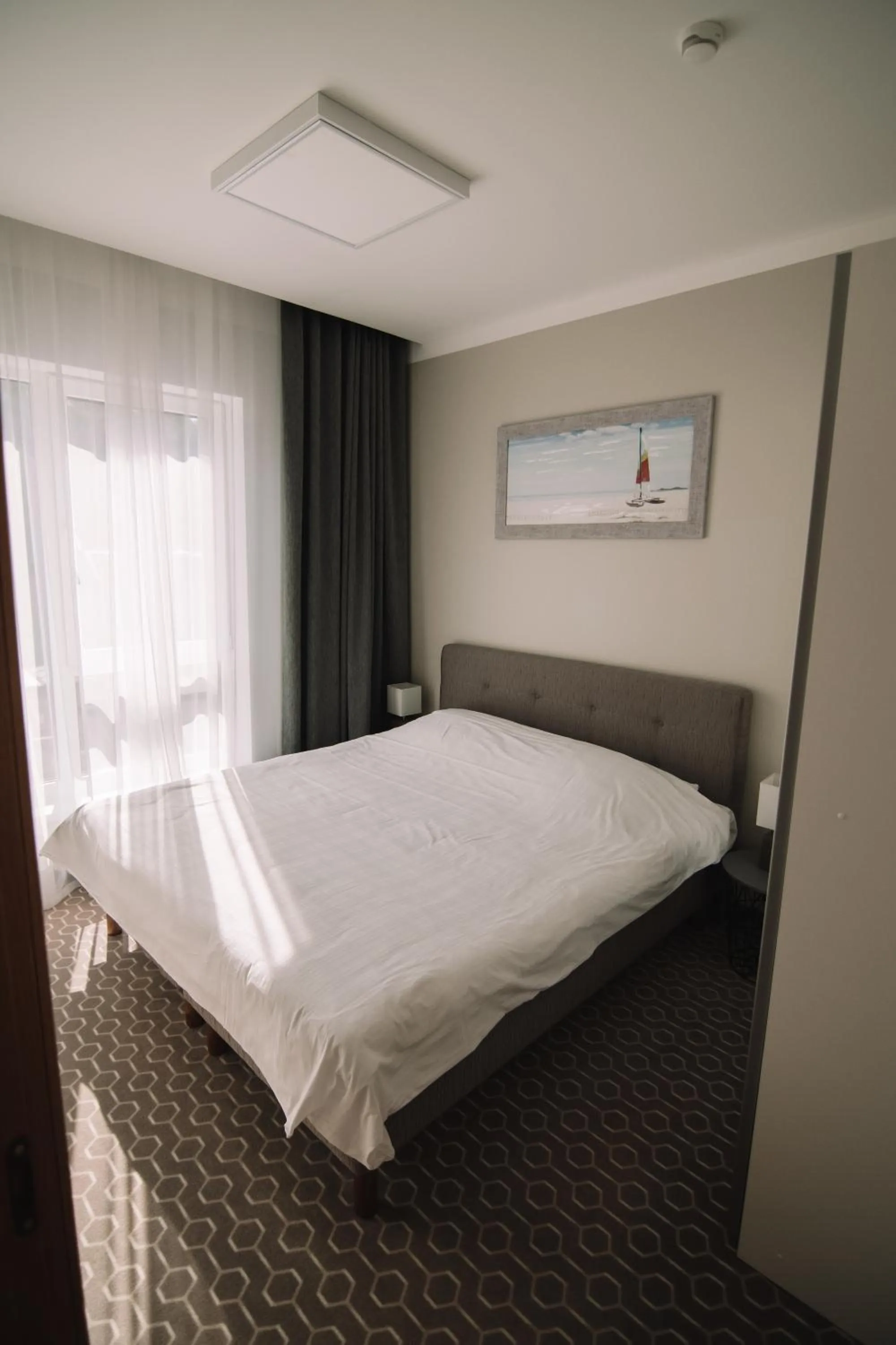 Bed in Merepargi ApartHotel & Cafe