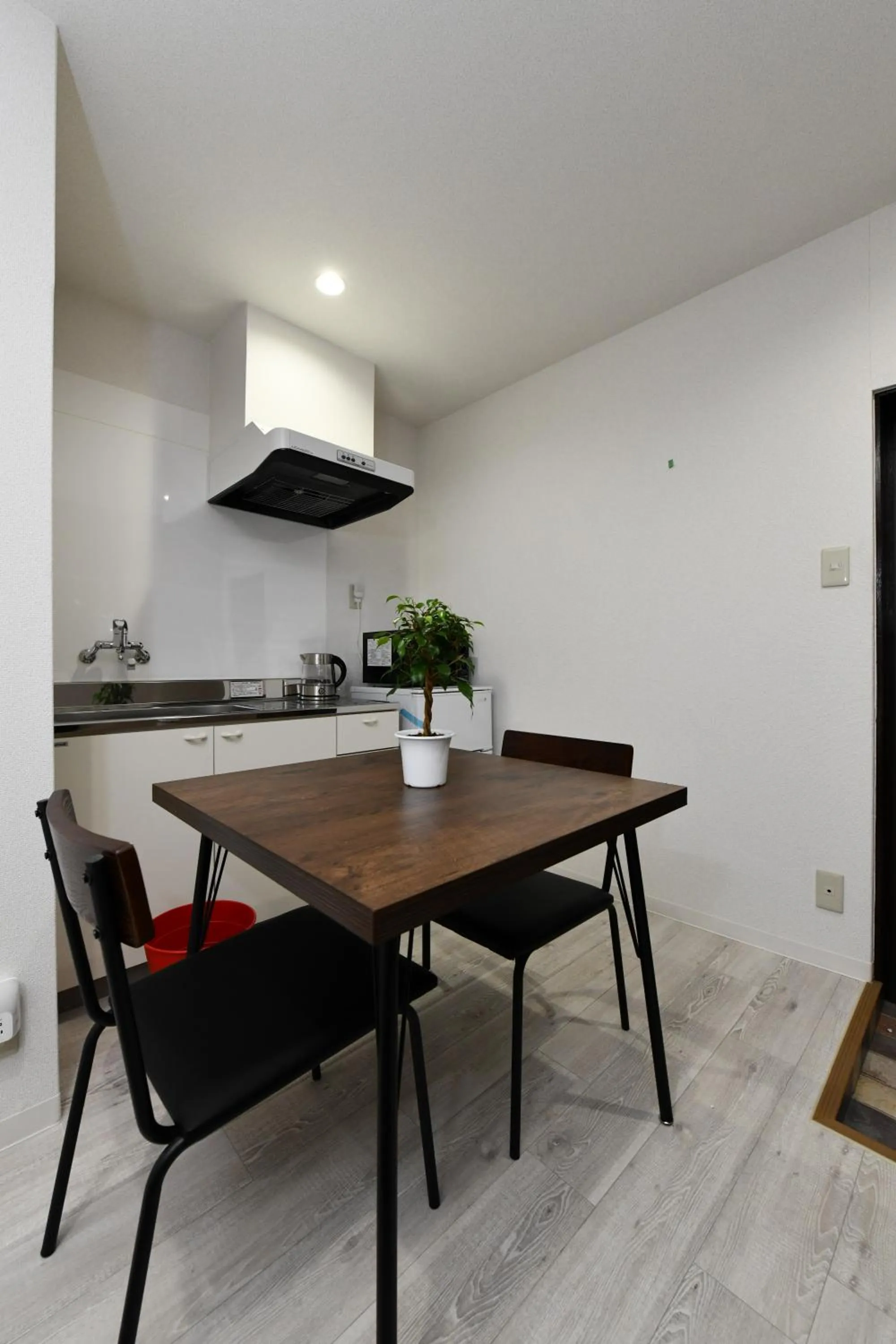 Kitchen or kitchenette in Suzumaru Hotel