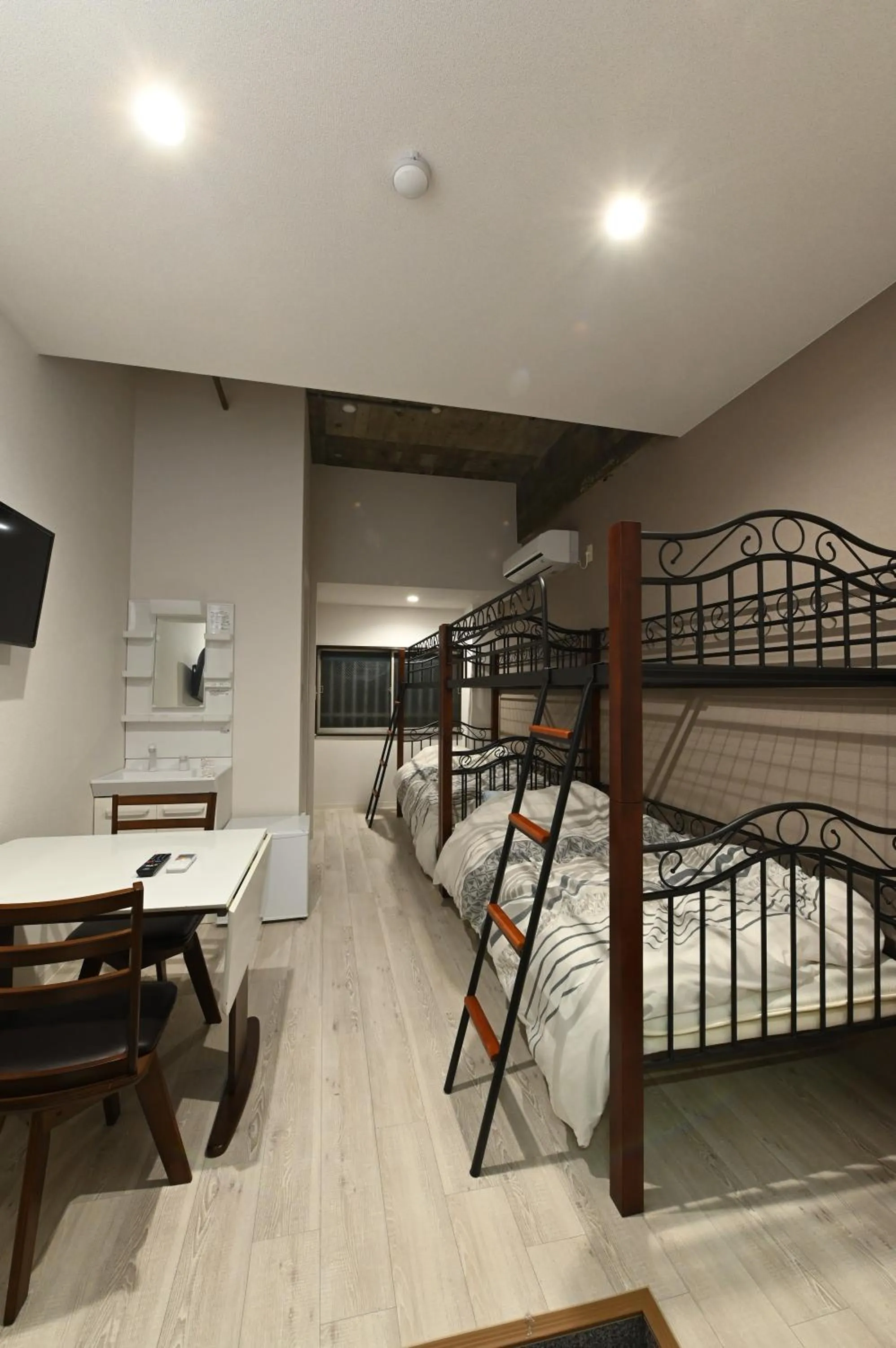 Bed in Suzumaru Hotel