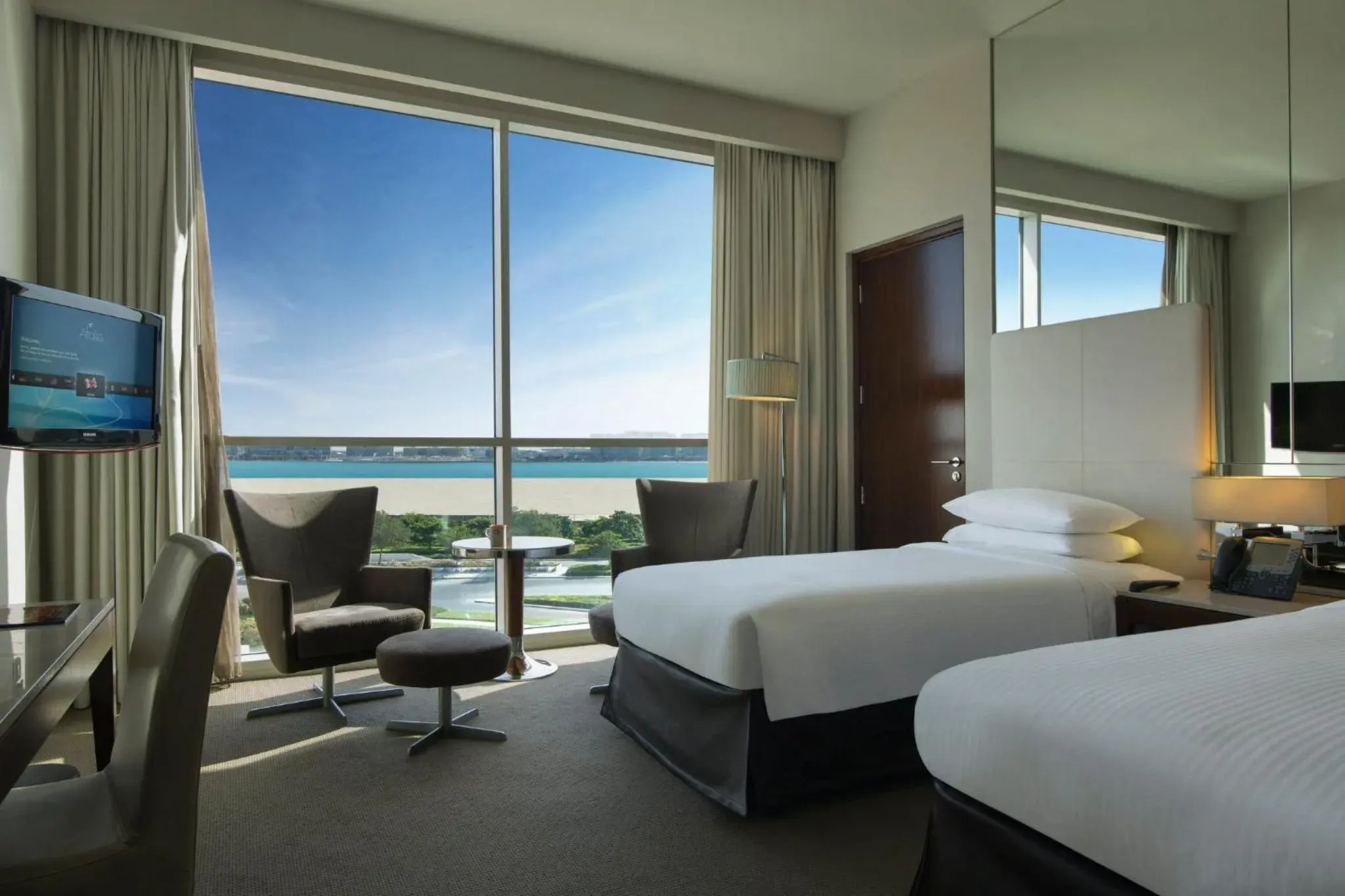Photo of the whole room, Bed in Yas Plaza Circuit by IHG Photo of the whole room, Bed in Yas Plaza Circuit by IHG