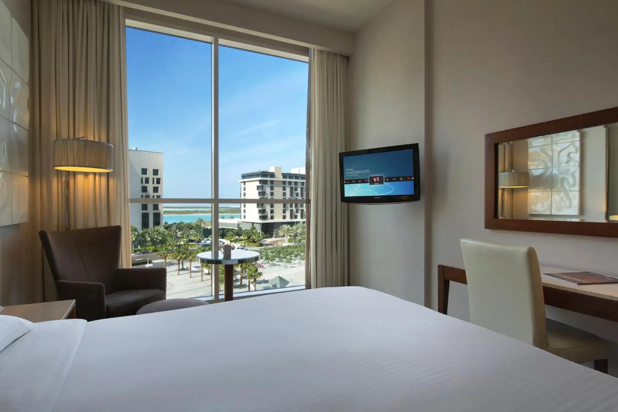 Photo of the whole room, Bed in Yas Plaza Circuit by IHG Photo of the whole room, Bed in Yas Plaza Circuit by IHG