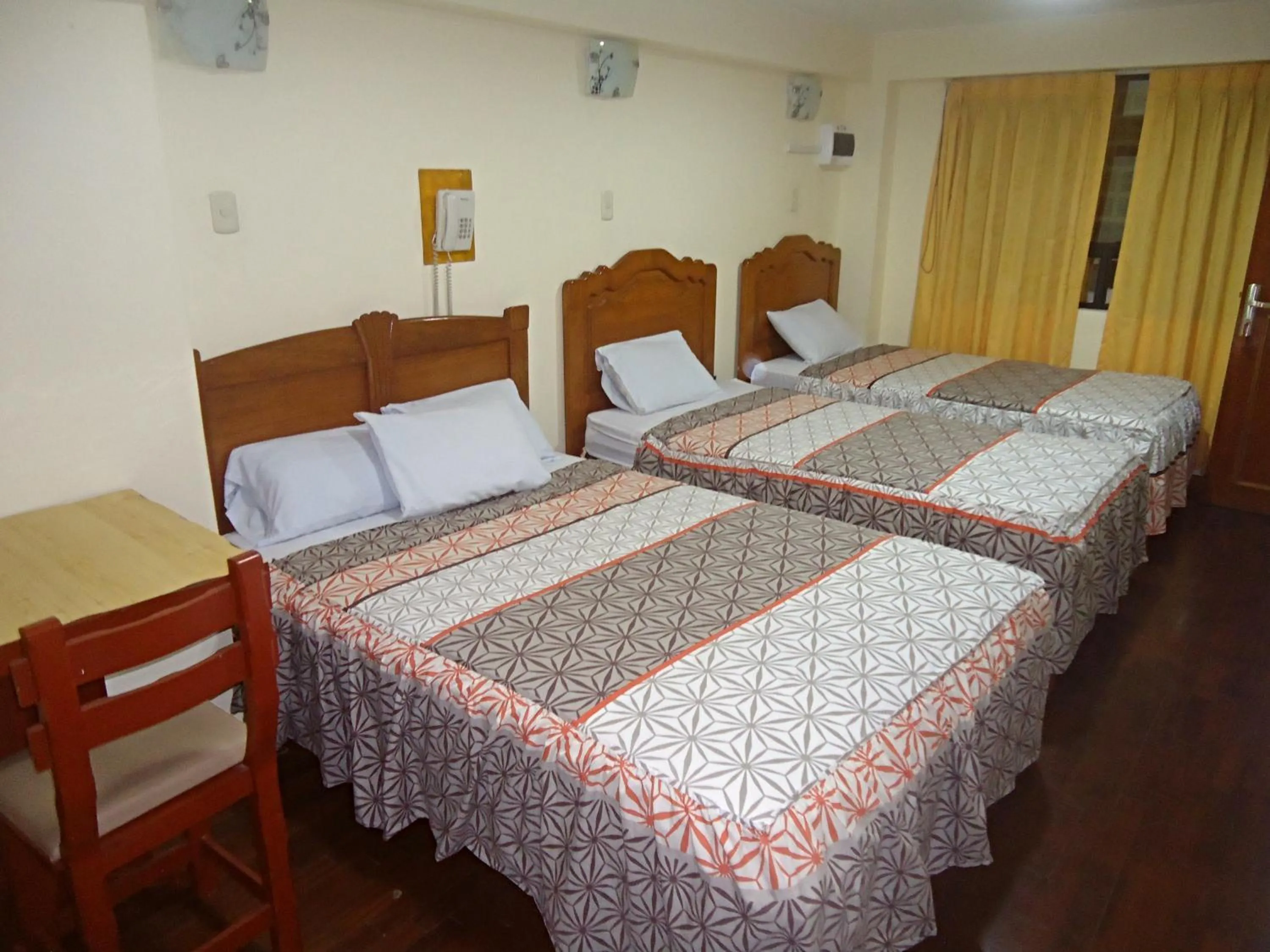 Bed in Hotel Panamericano