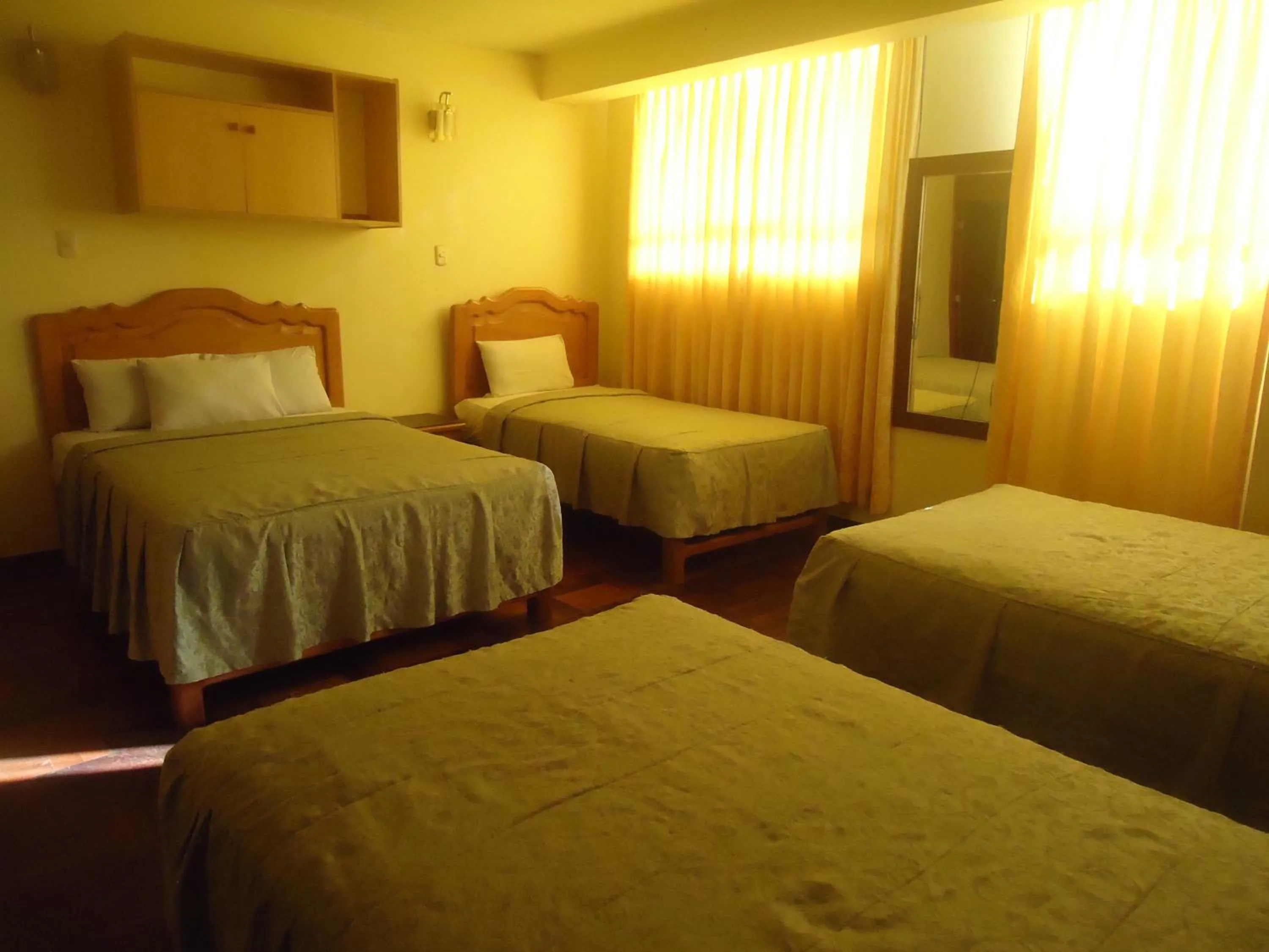 Bed in Hotel Panamericano