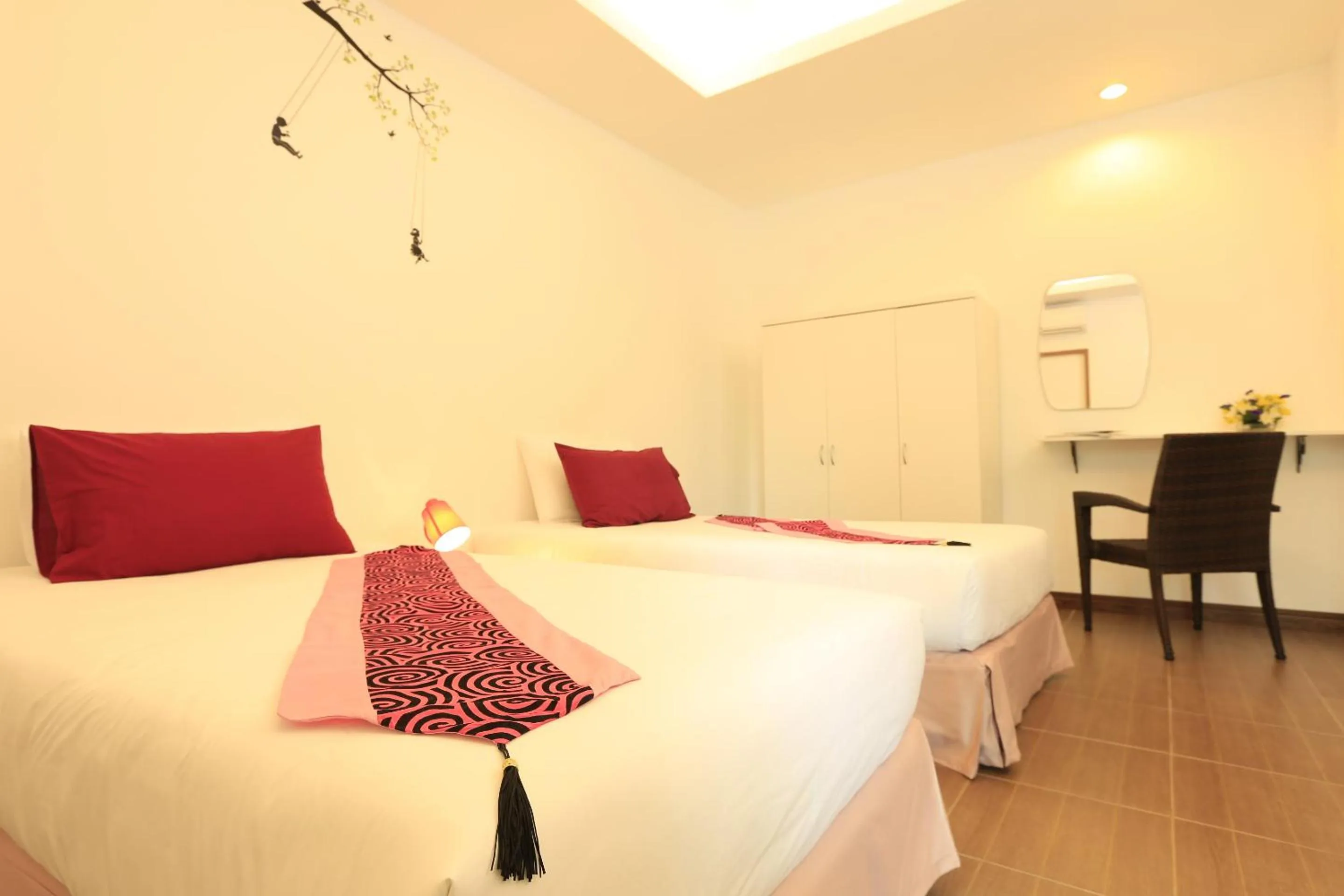 Bed in White Cat Hotel