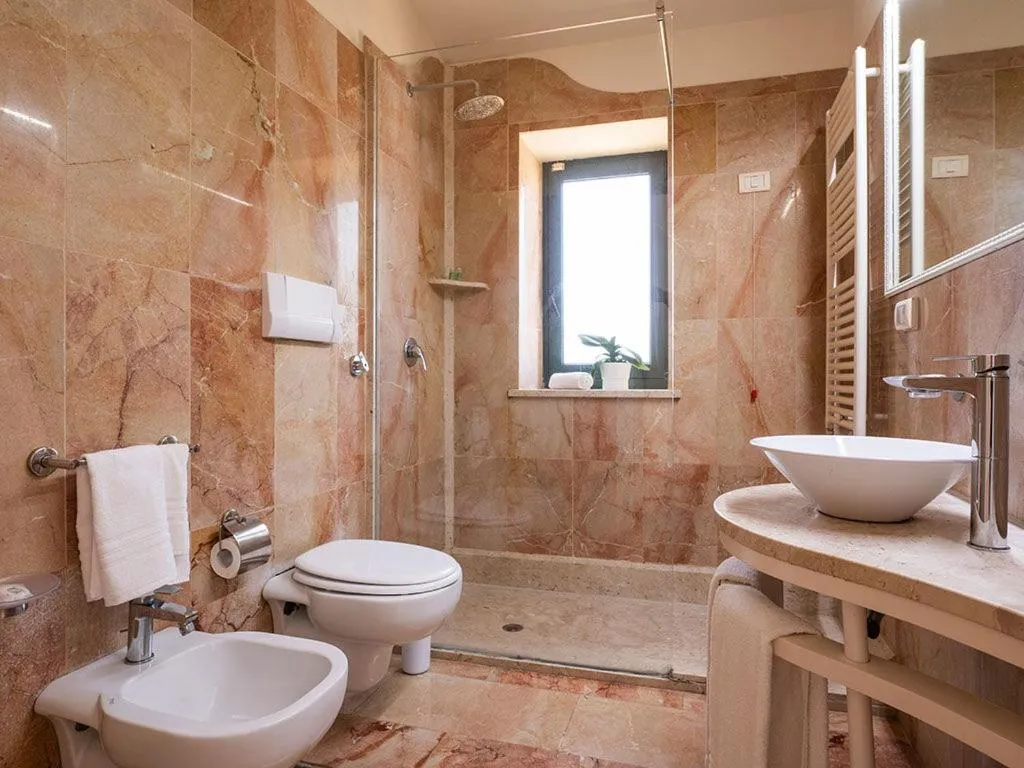 Bathroom in Delfino Beach - CDSHotels