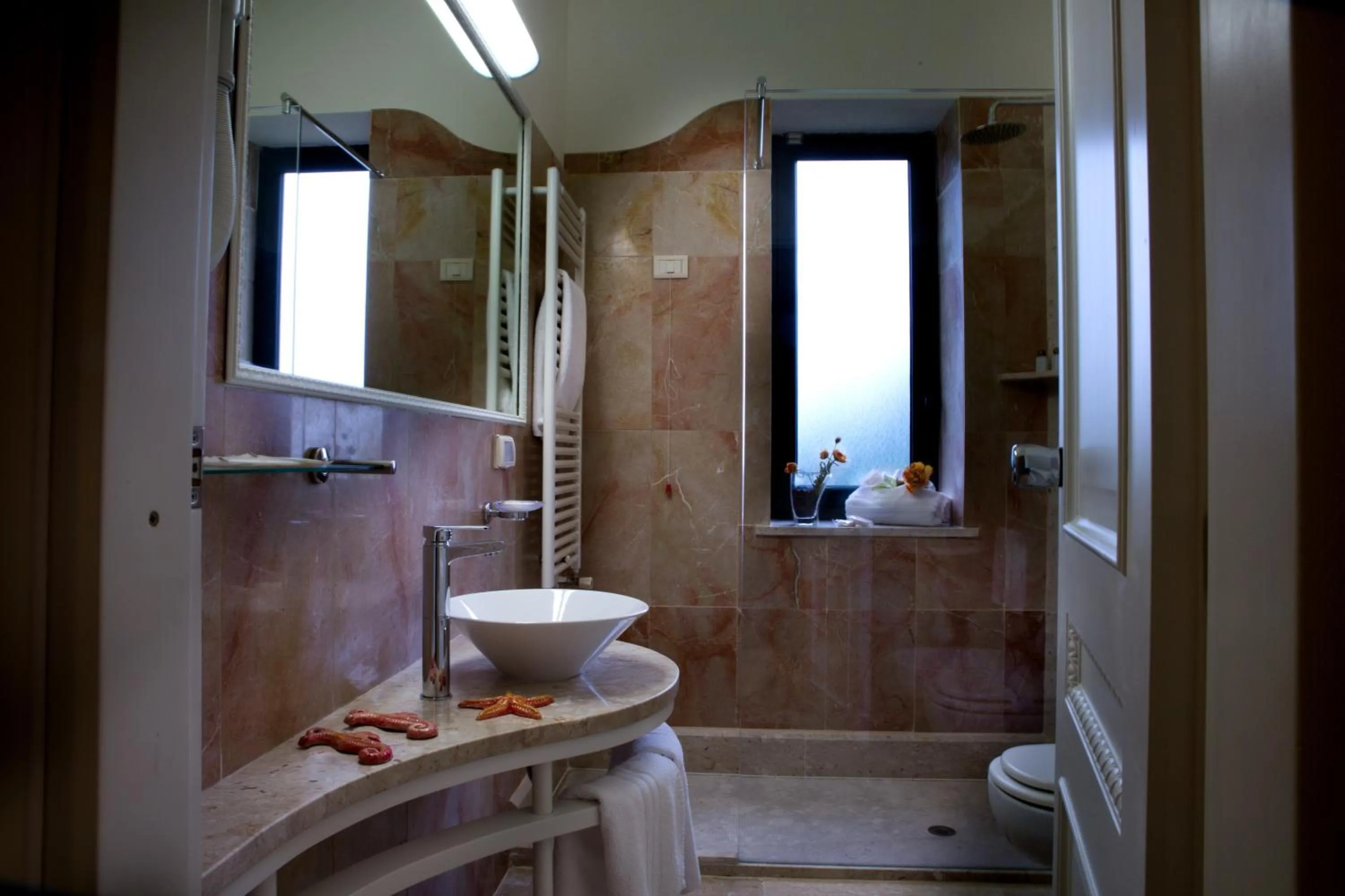 Bathroom in Delfino Beach Hotel