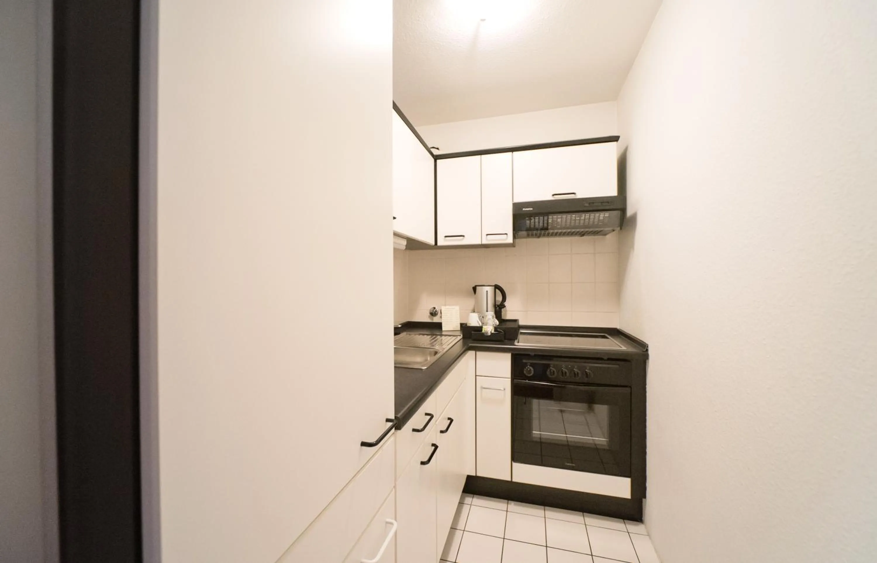 Kitchen or kitchenette in City-Hotel Am Wasserturm Halle