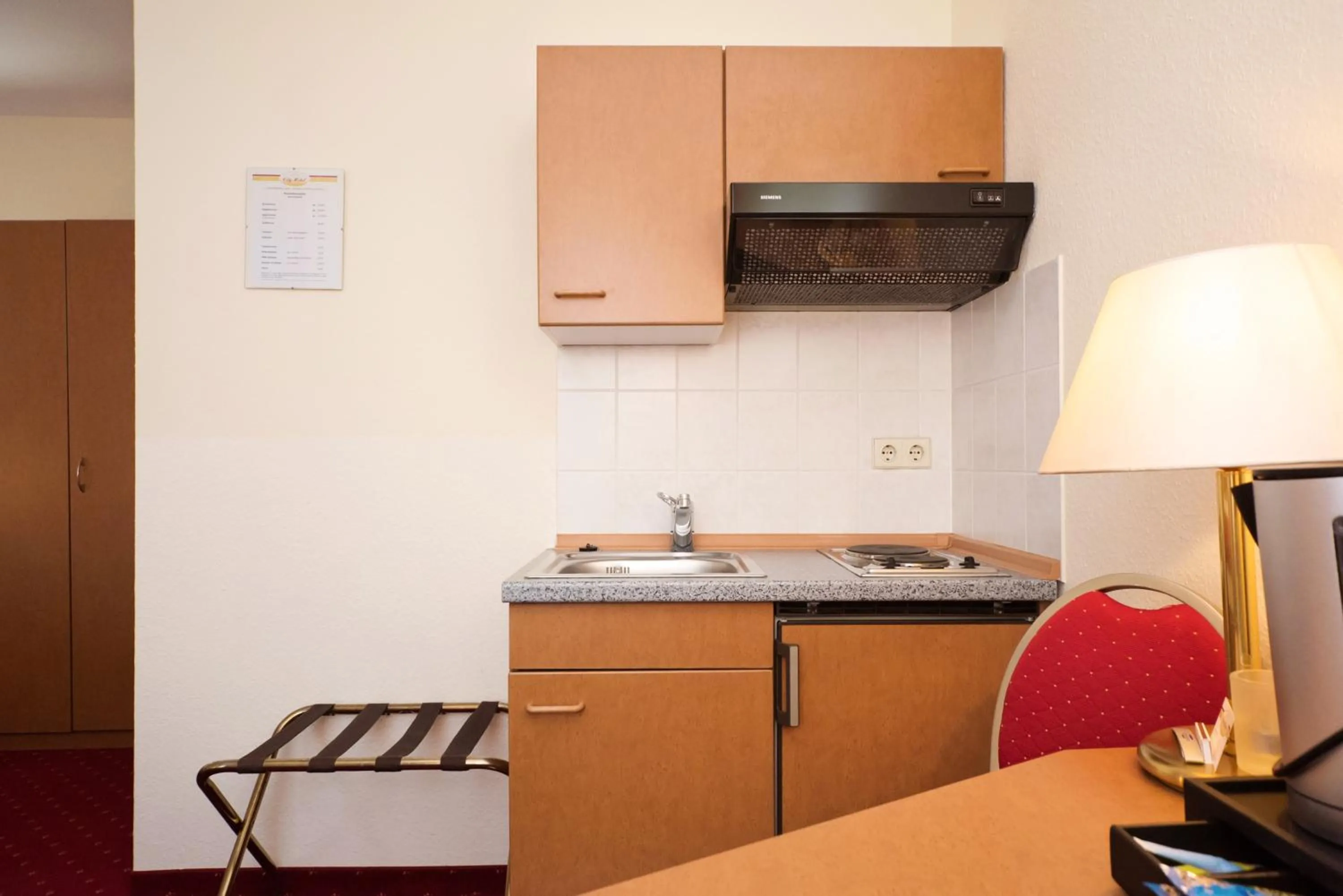 Kitchen or kitchenette in City-Hotel Am Wasserturm Halle