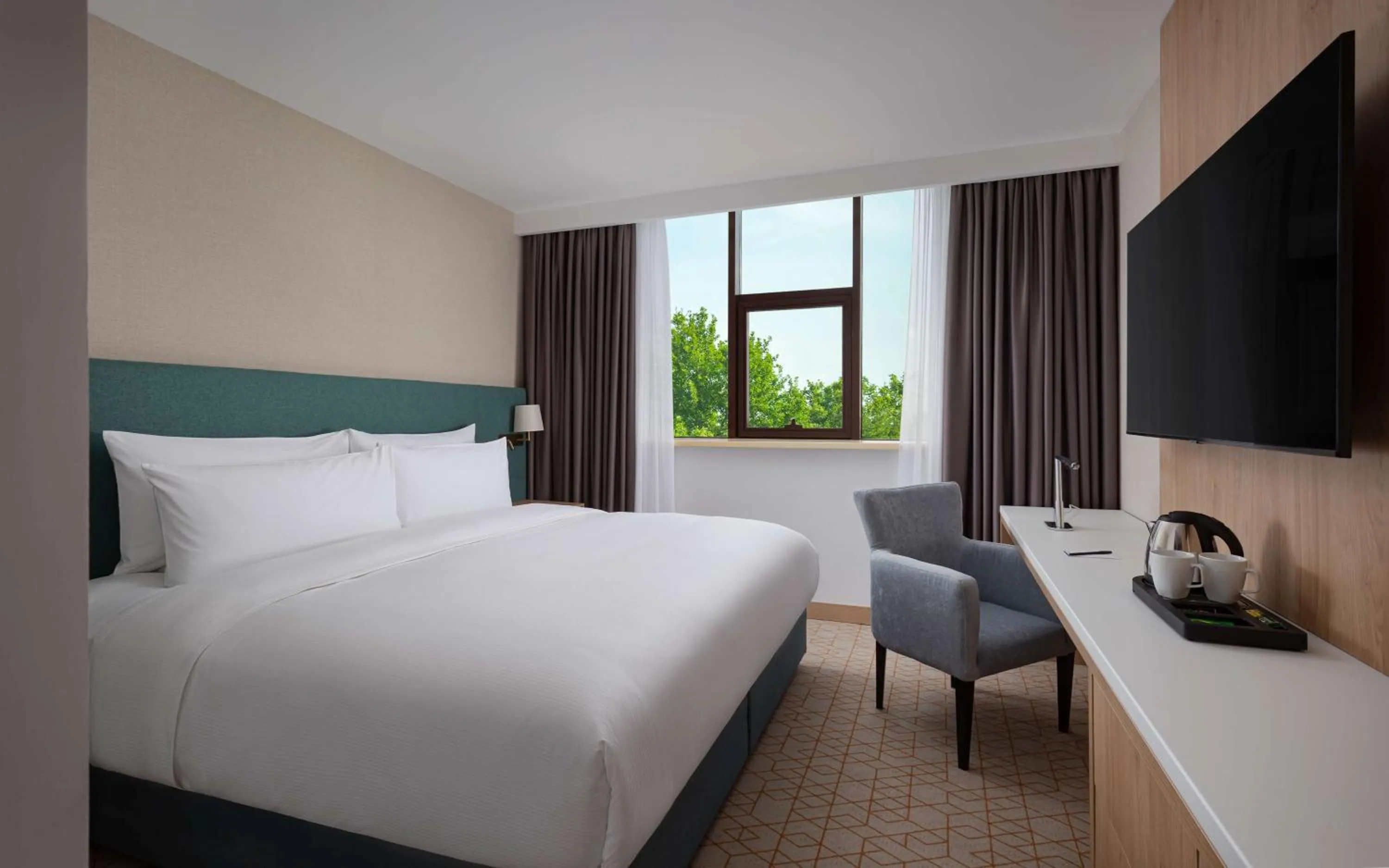Bedroom, Bed in DoubleTree by Hilton Shymkent