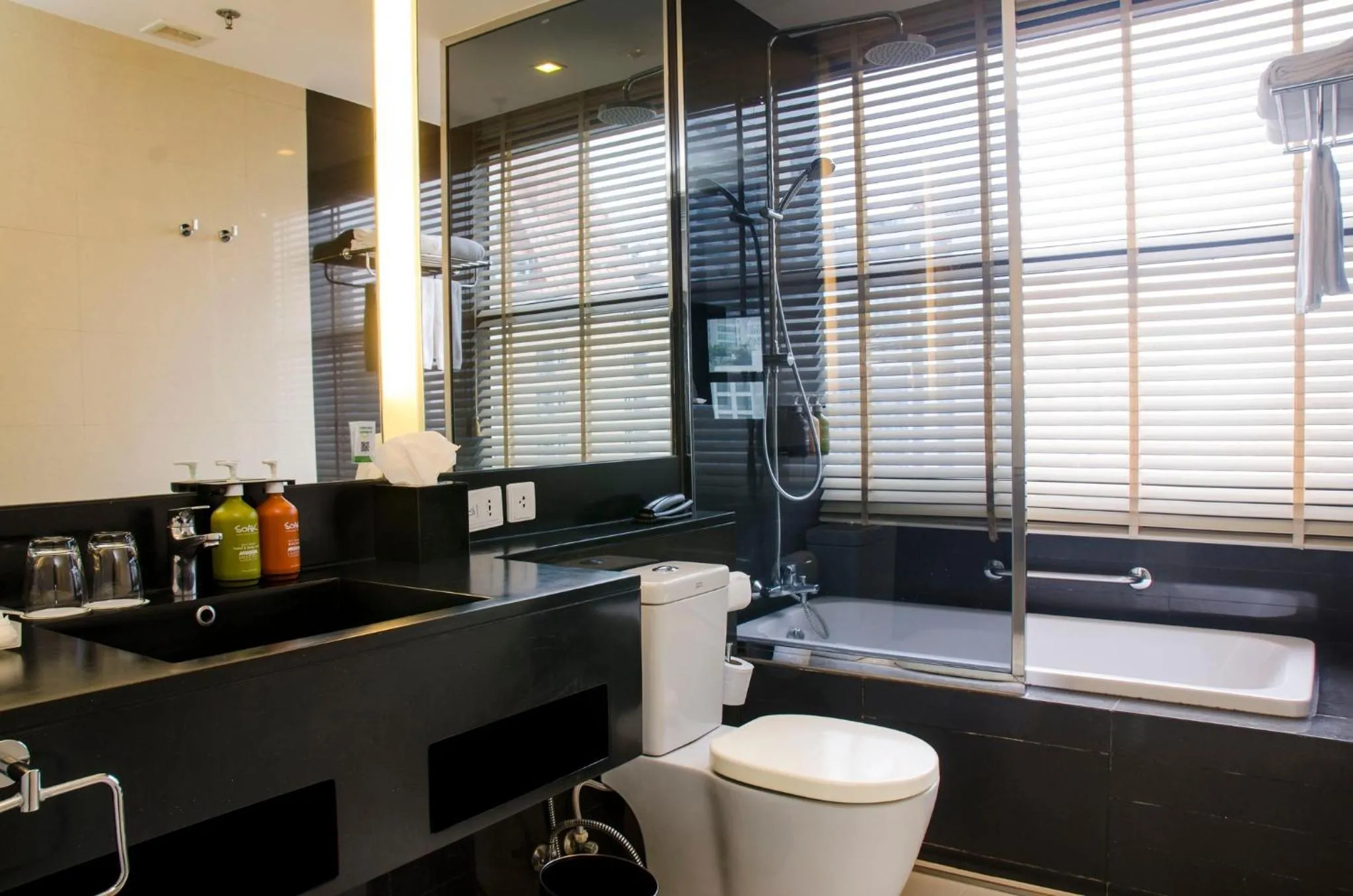 Bathroom in Holiday Inn Bangkok Sukhumvit by IHG