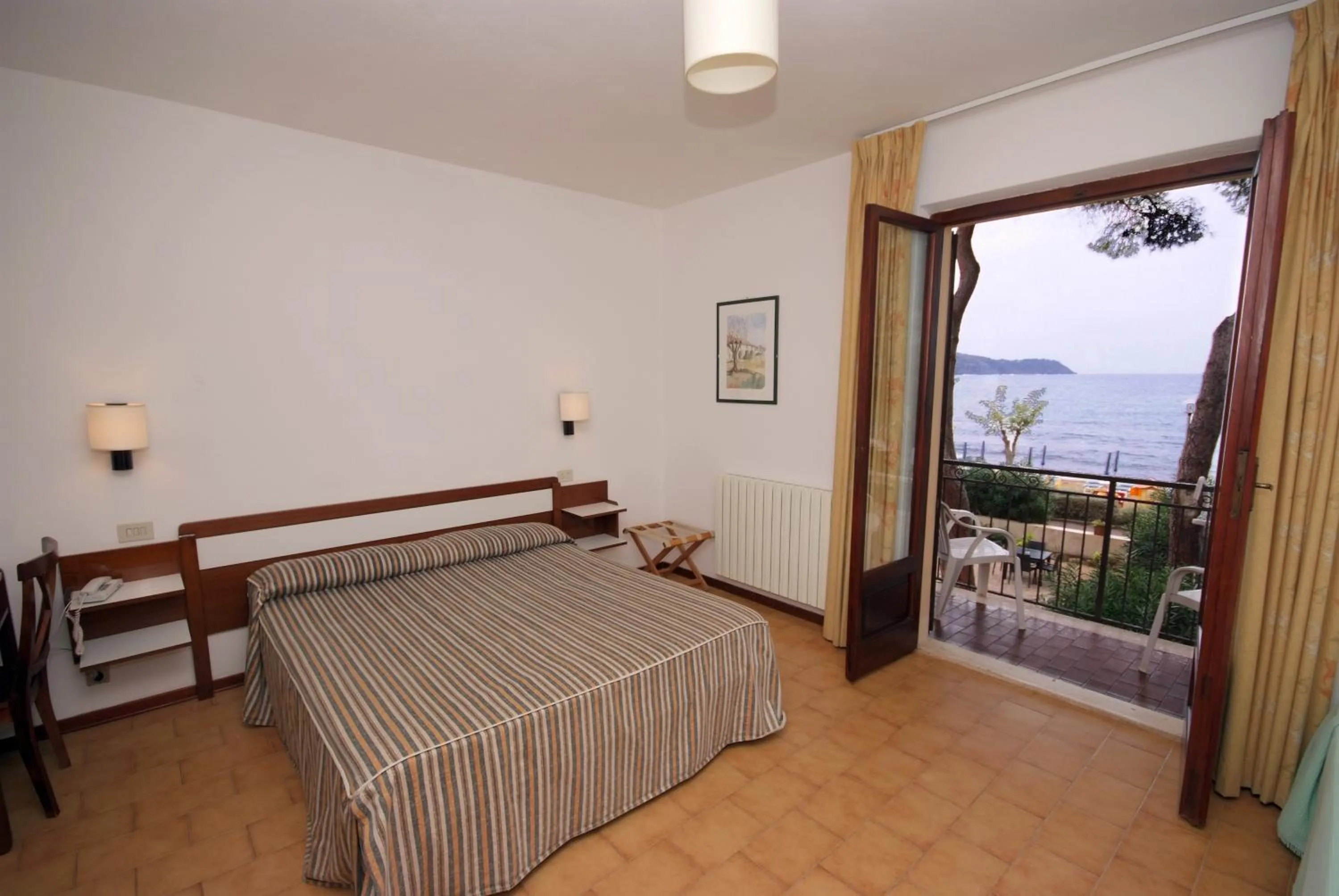 Bed in Hotel Voce del Mare