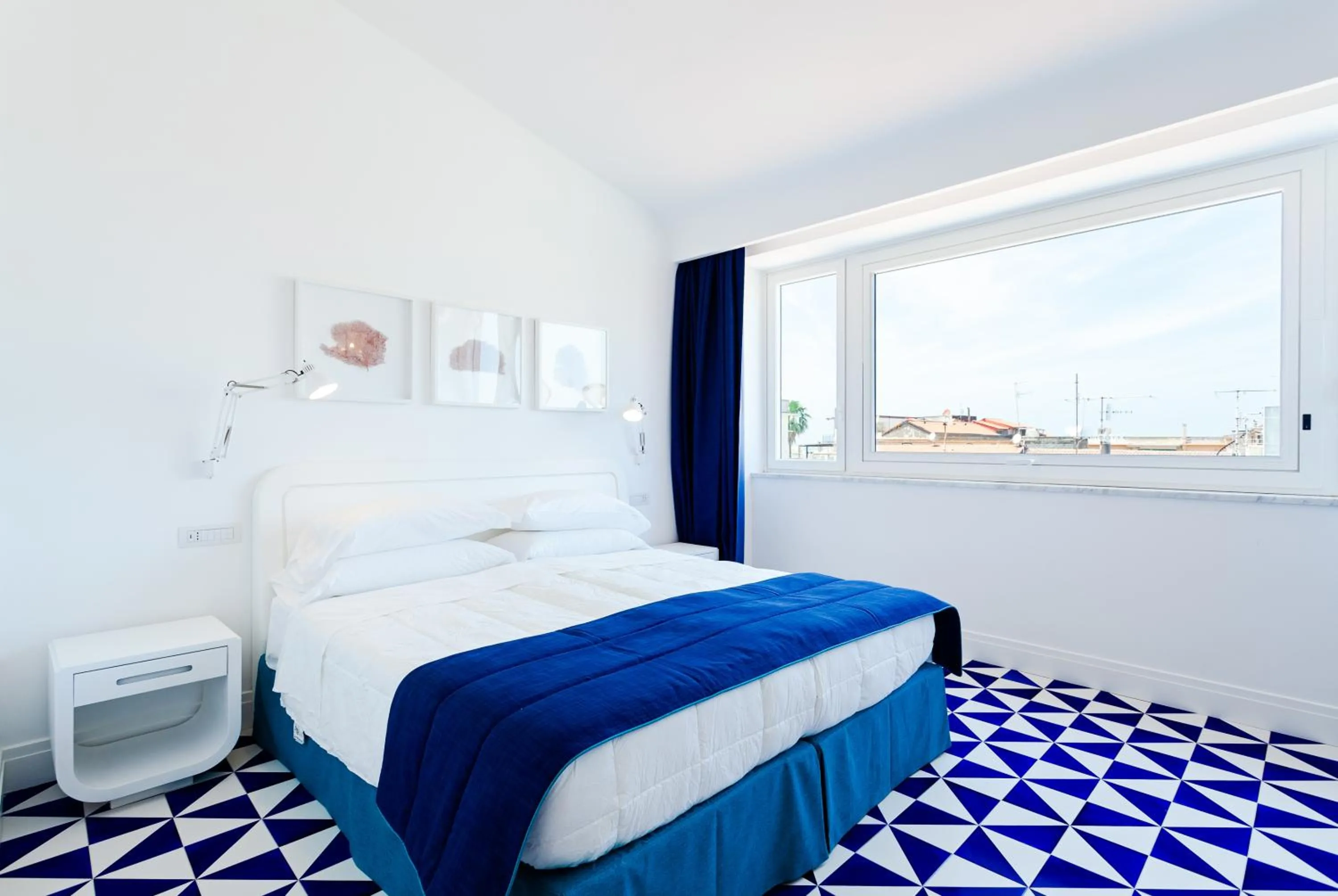 Bed in Maison Blu - Intimate GuestHouse