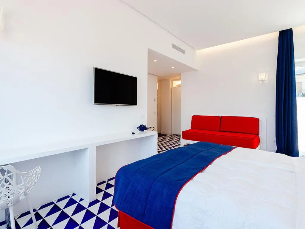 Bed in Maison Blu - Intimate GuestHouse