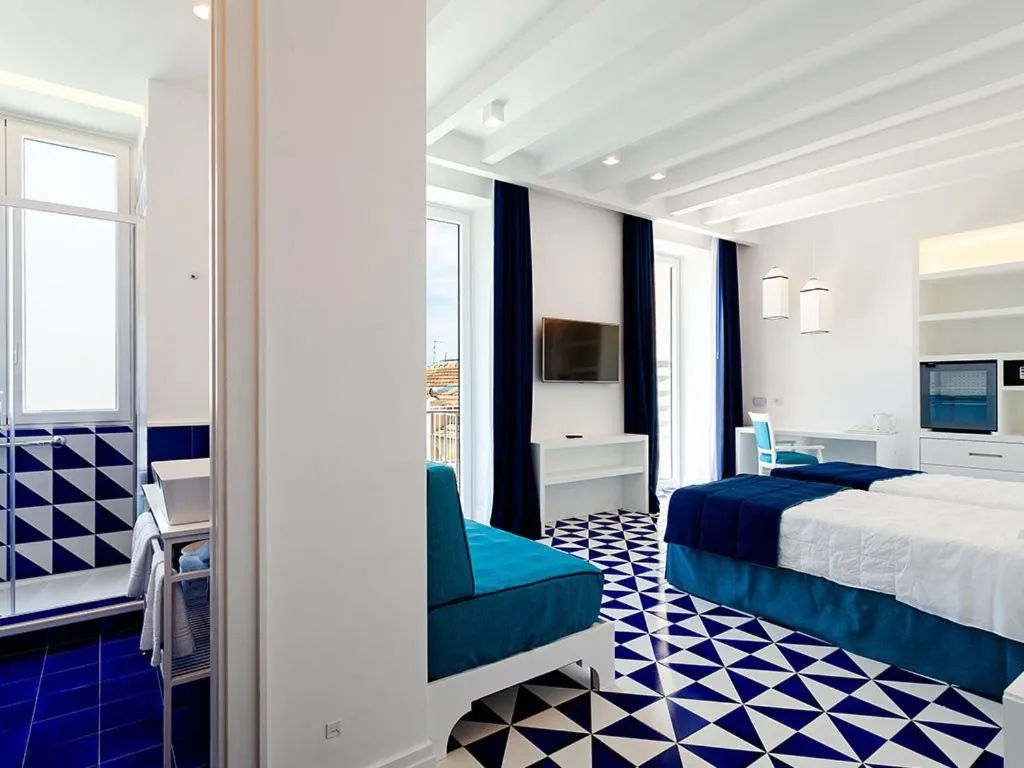 Bed in Maison Blu - Intimate GuestHouse