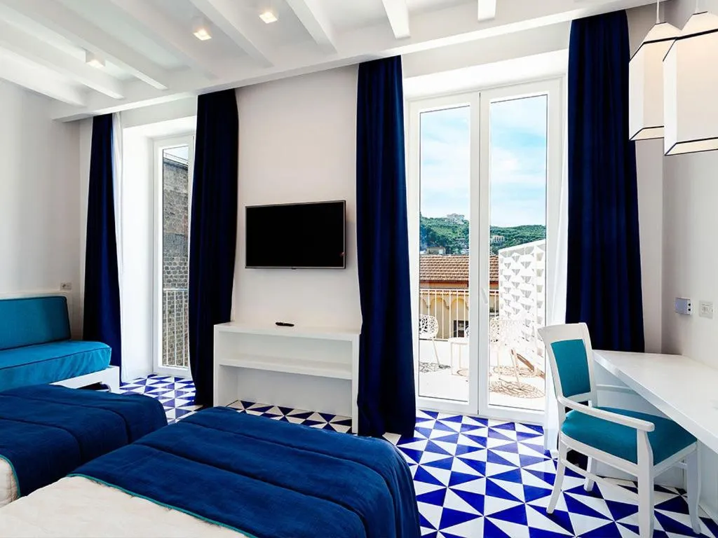 Bed in Maison Blu - Intimate GuestHouse