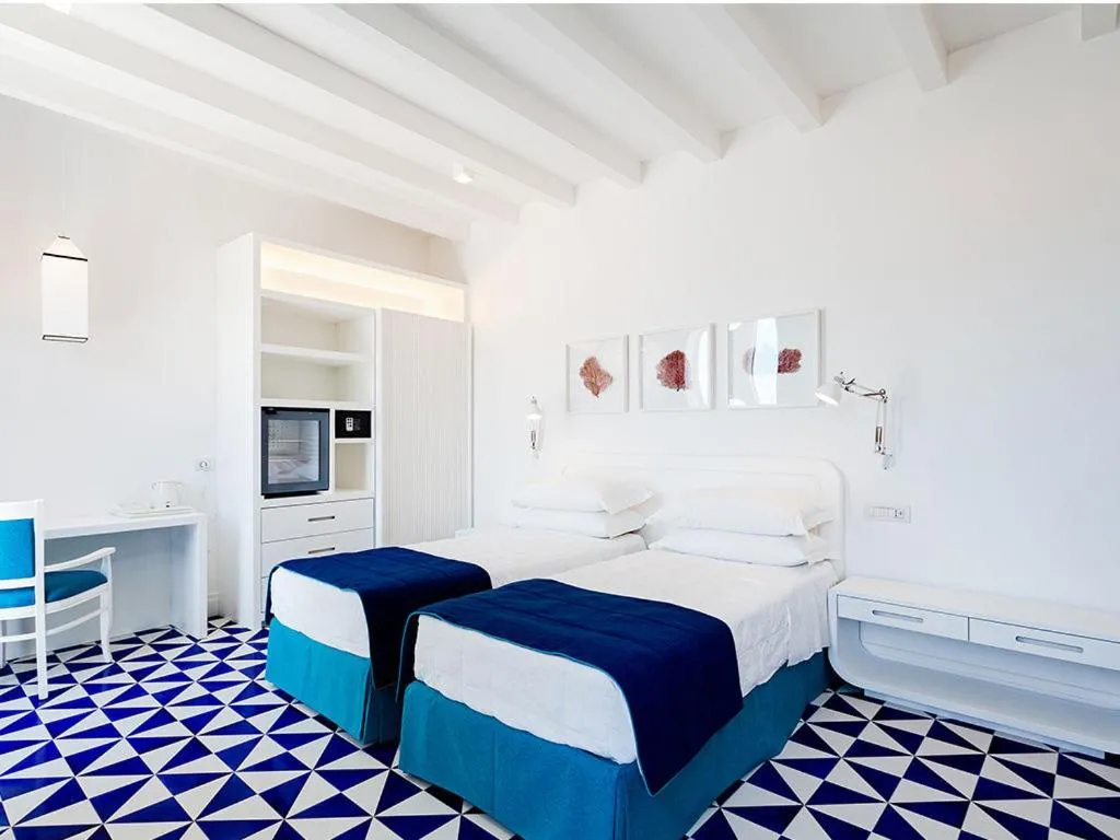 Bed in Maison Blu - Intimate GuestHouse