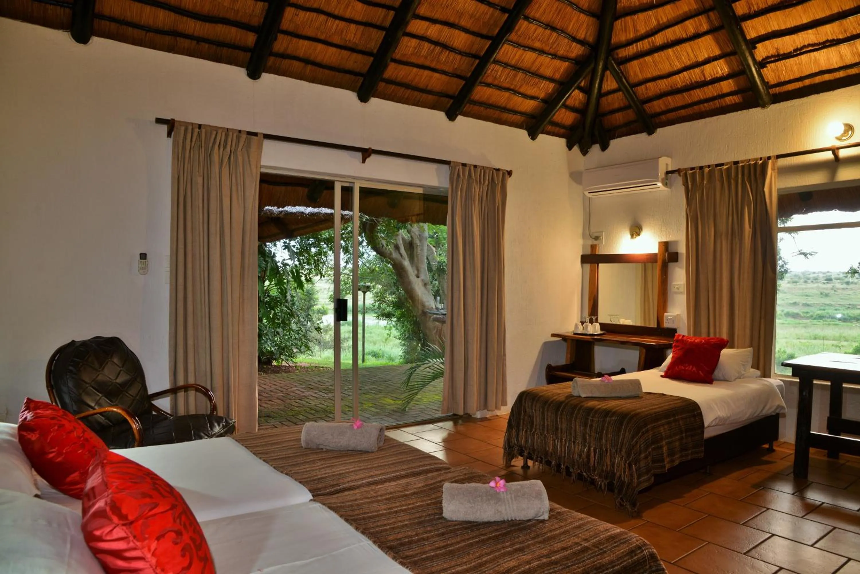 Photo of the whole room, Bed in Elephant Walk Retreat