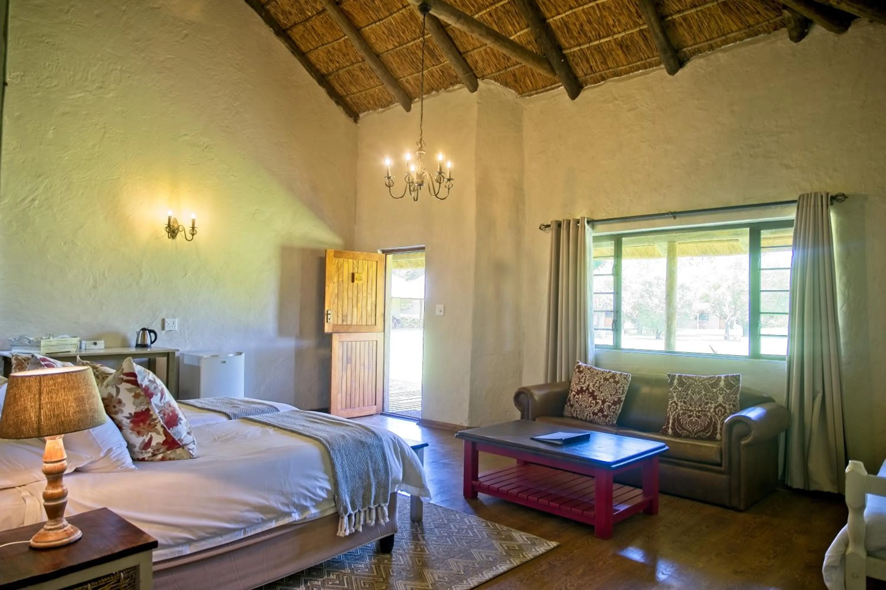 Photo of the whole room, Bed in Chrislin African Lodge