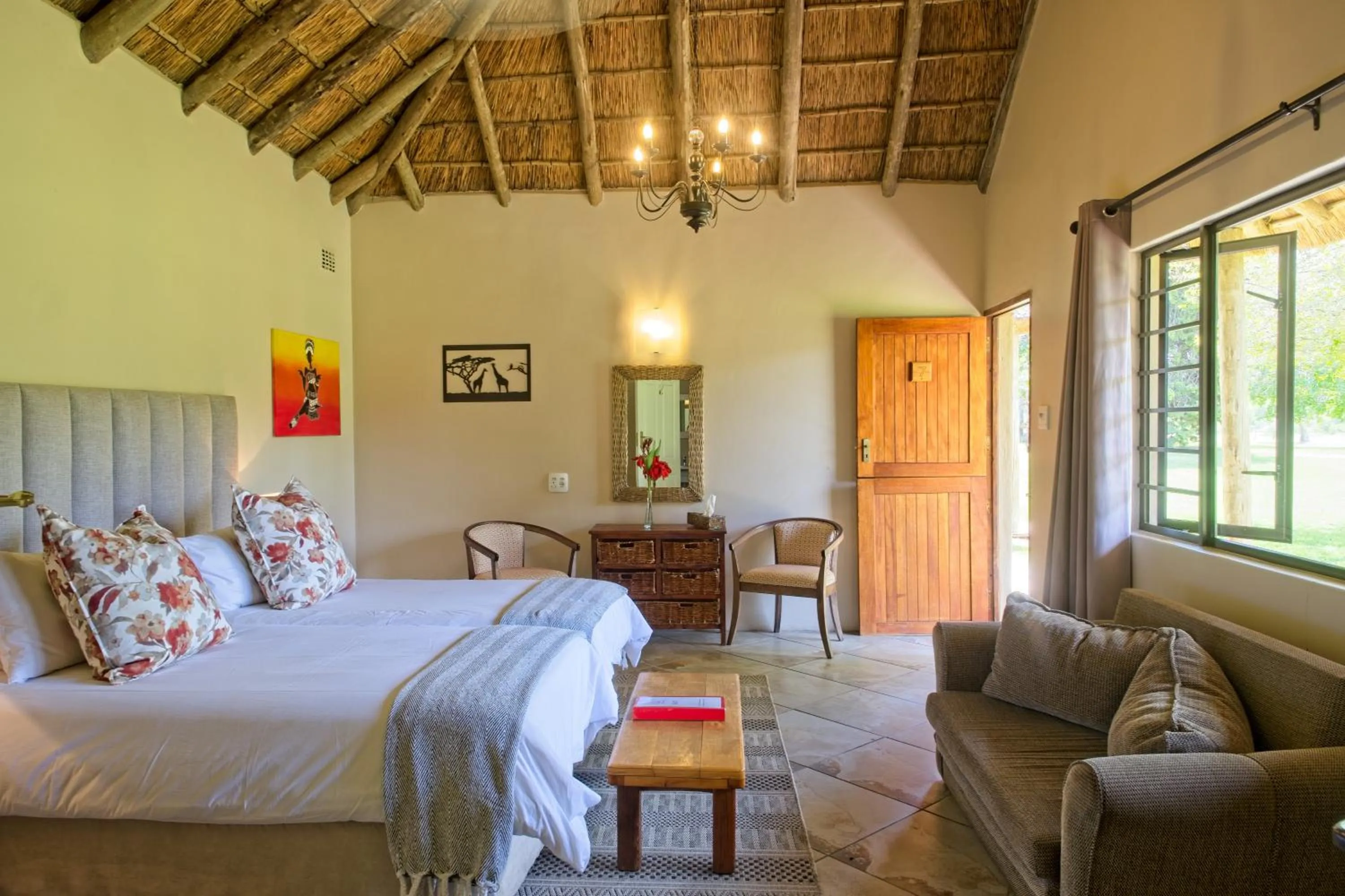 Photo of the whole room, Bed in Chrislin African Lodge