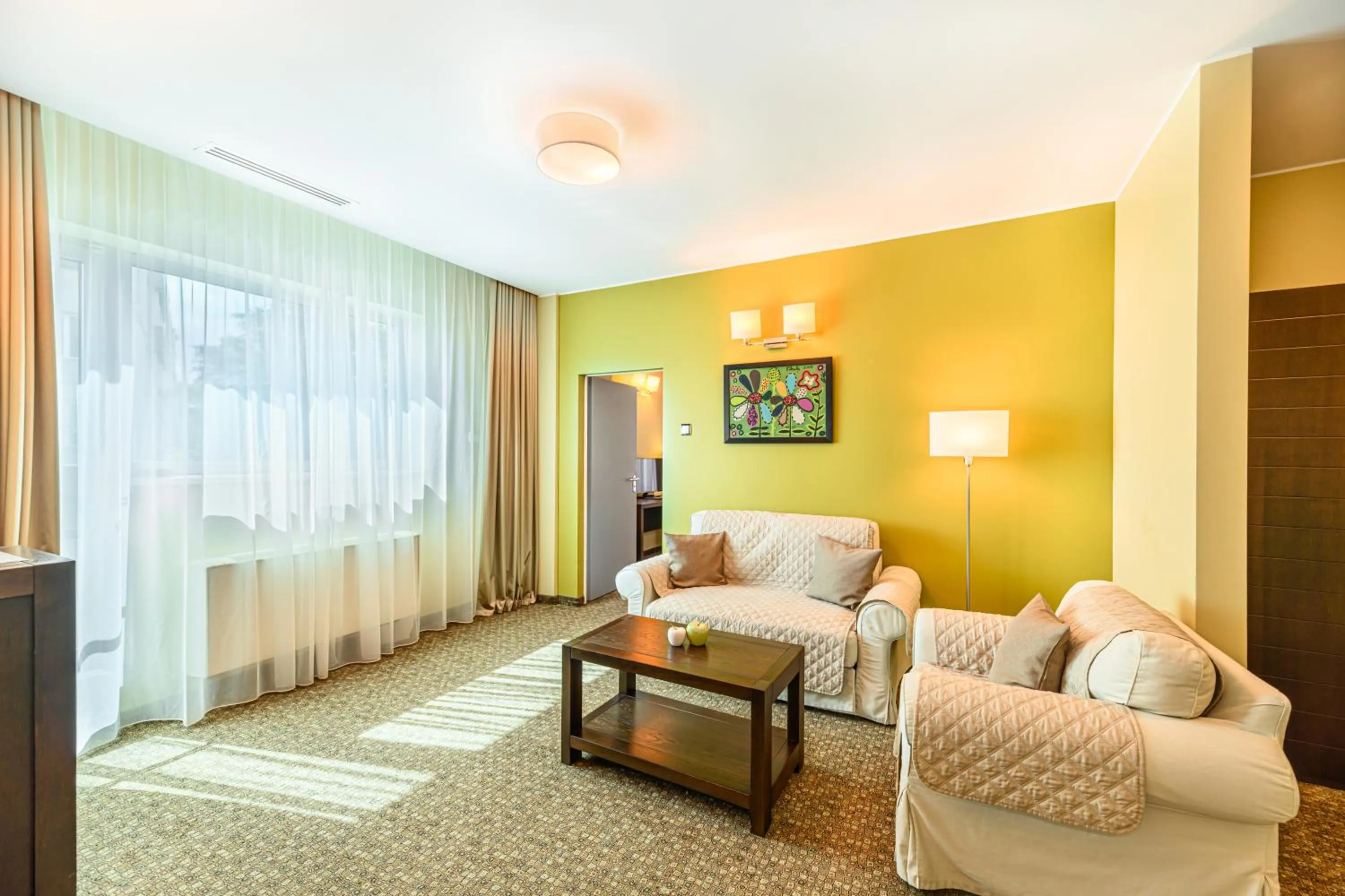 Living room, Bed in Vega Hotel