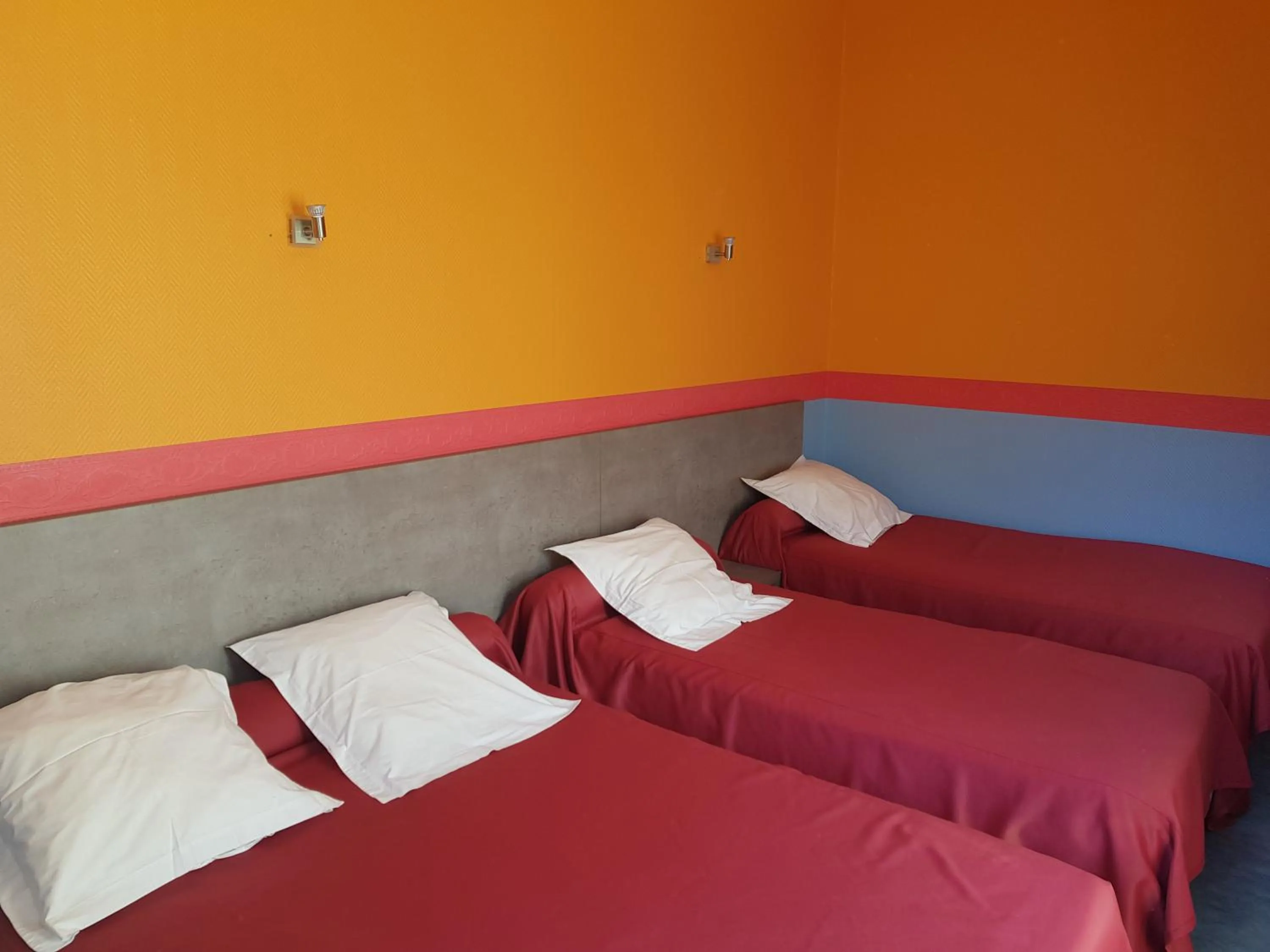 Bed in Hotel des voyageurs Chez Betty