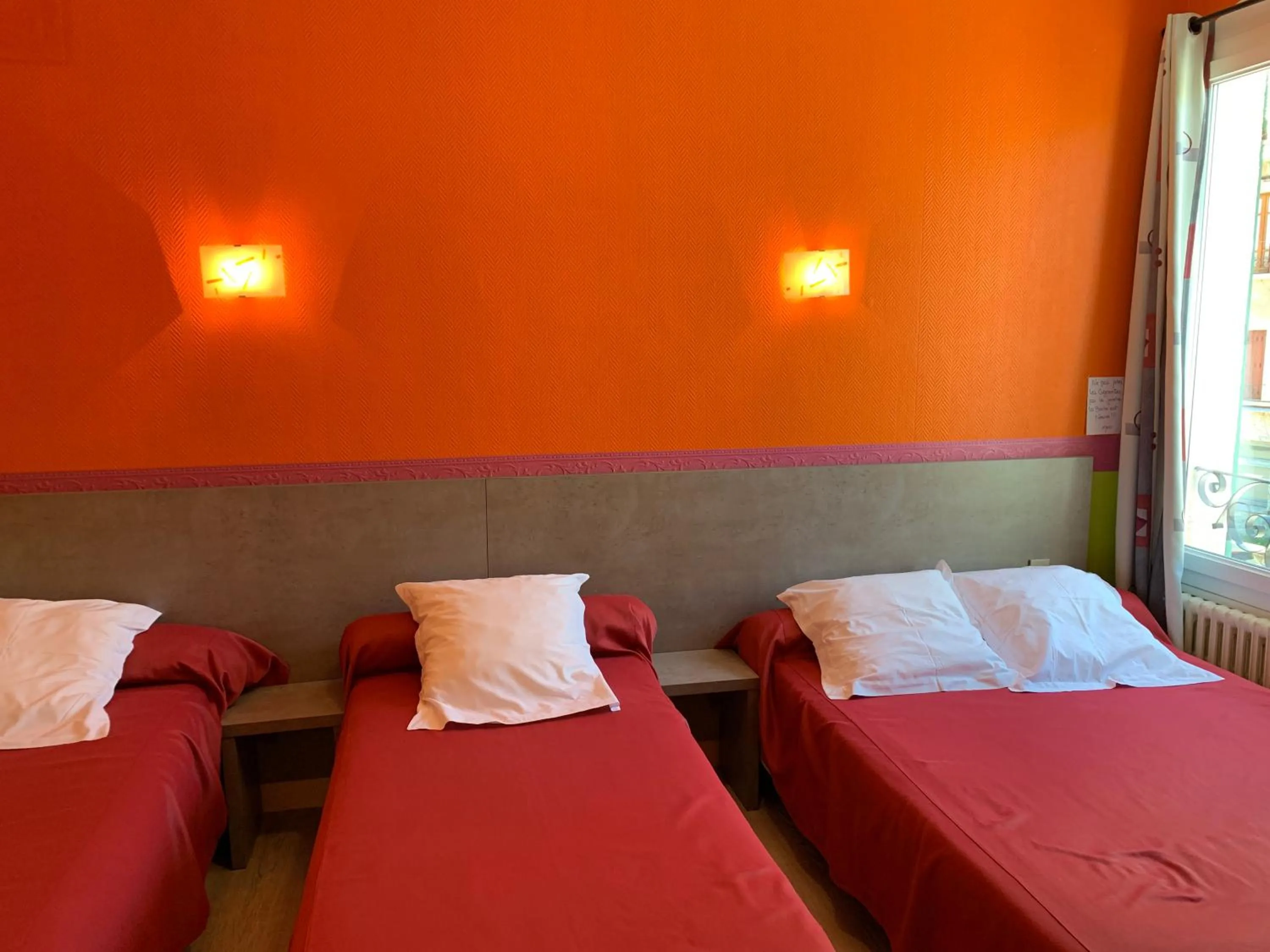 Bed in Hotel des voyageurs Chez Betty