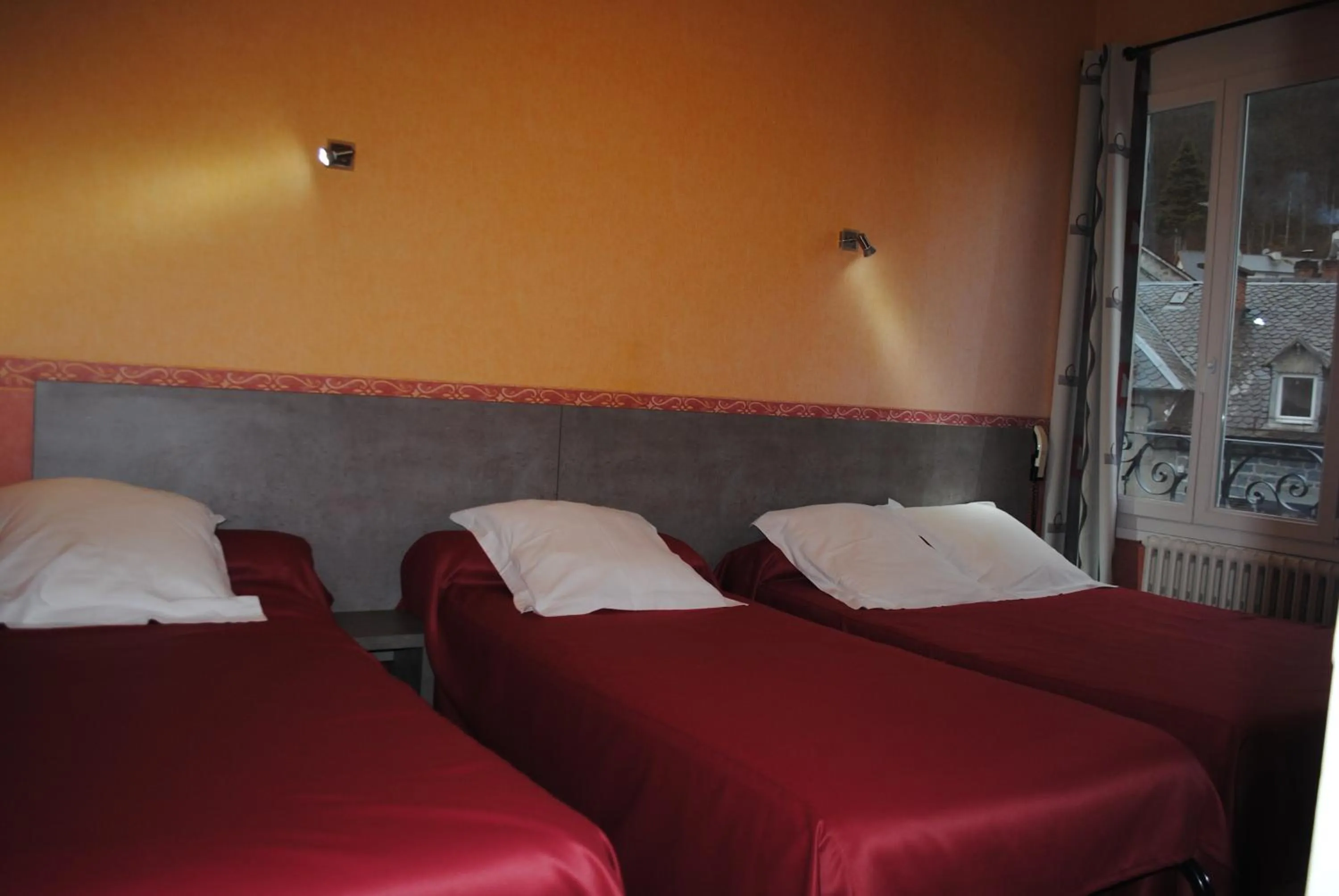 Bed in Hotel des voyageurs Chez Betty