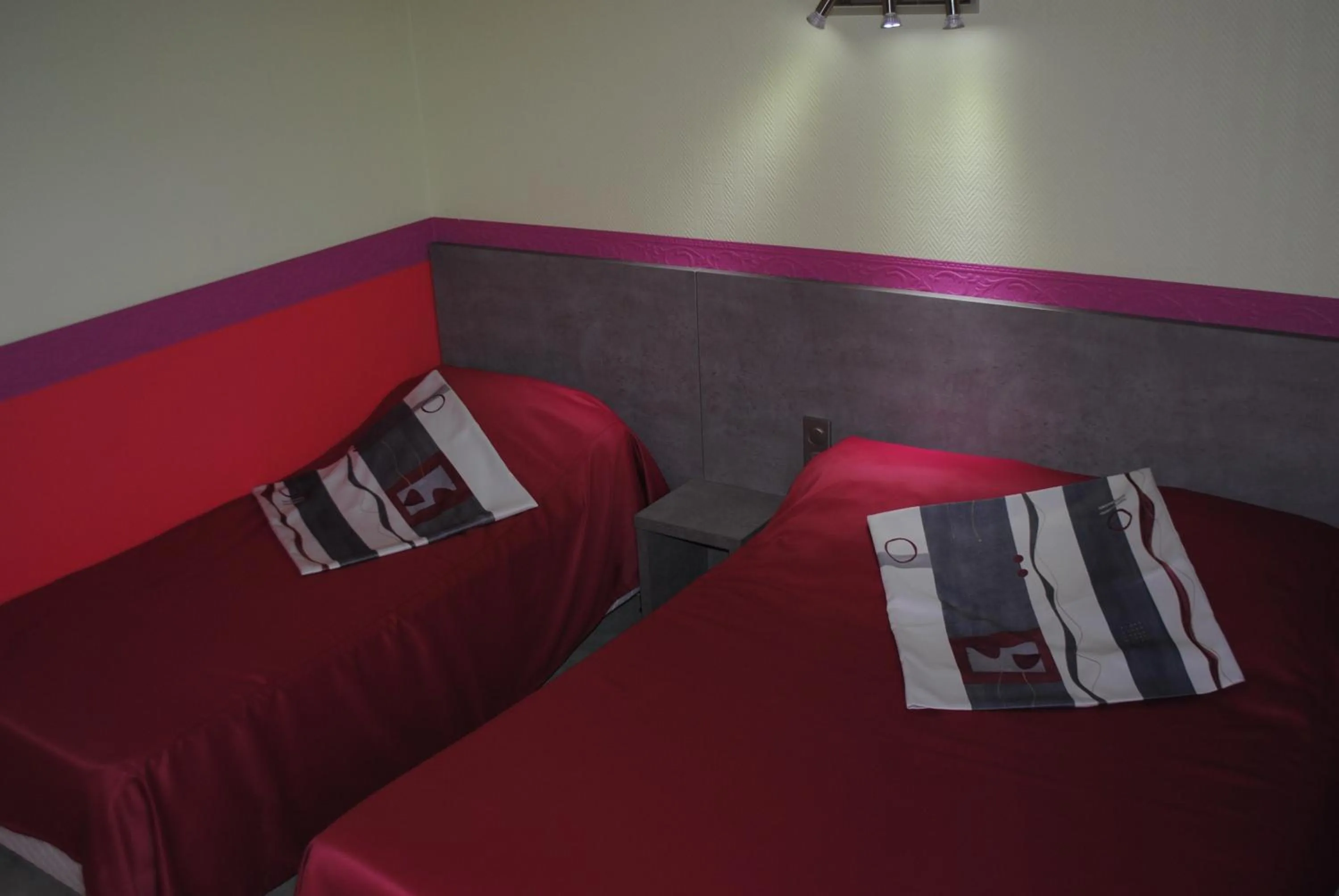 Bed in Hotel des voyageurs Chez Betty