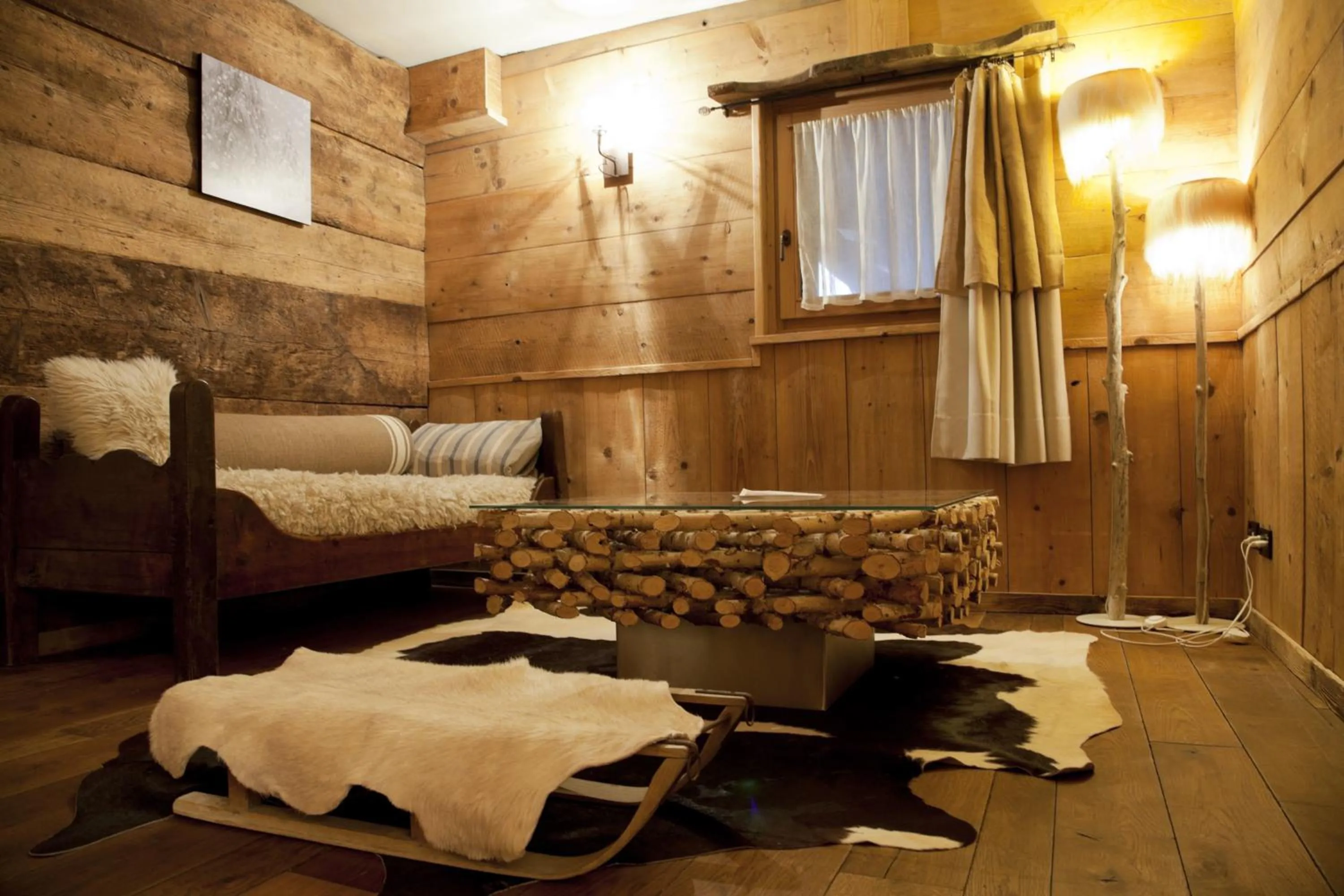 Living room, Bed in Chalet Svizzero